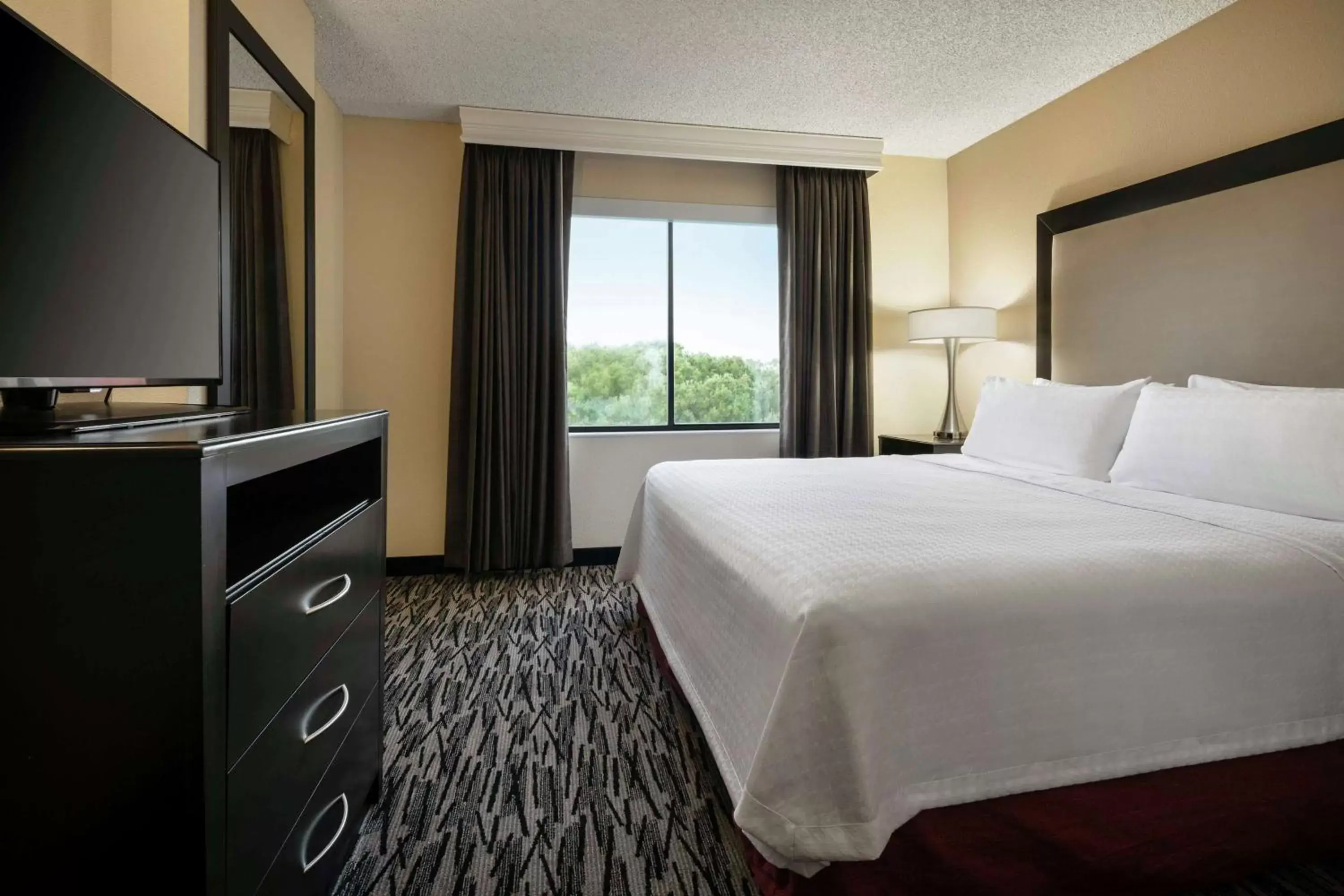 Bed in Homewood Suites by Hilton-Anaheim