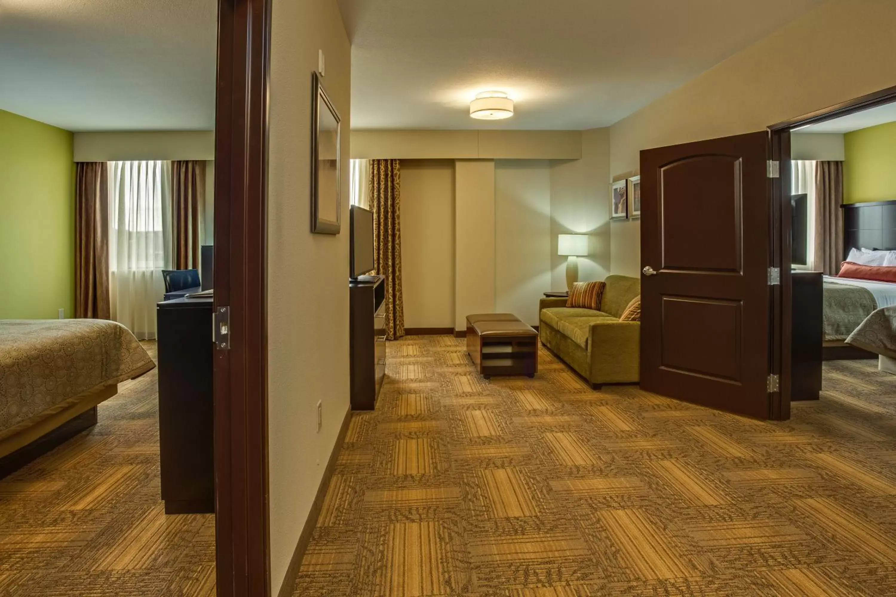 Bedroom, Seating Area in Staybridge Suites Atlanta Airport
