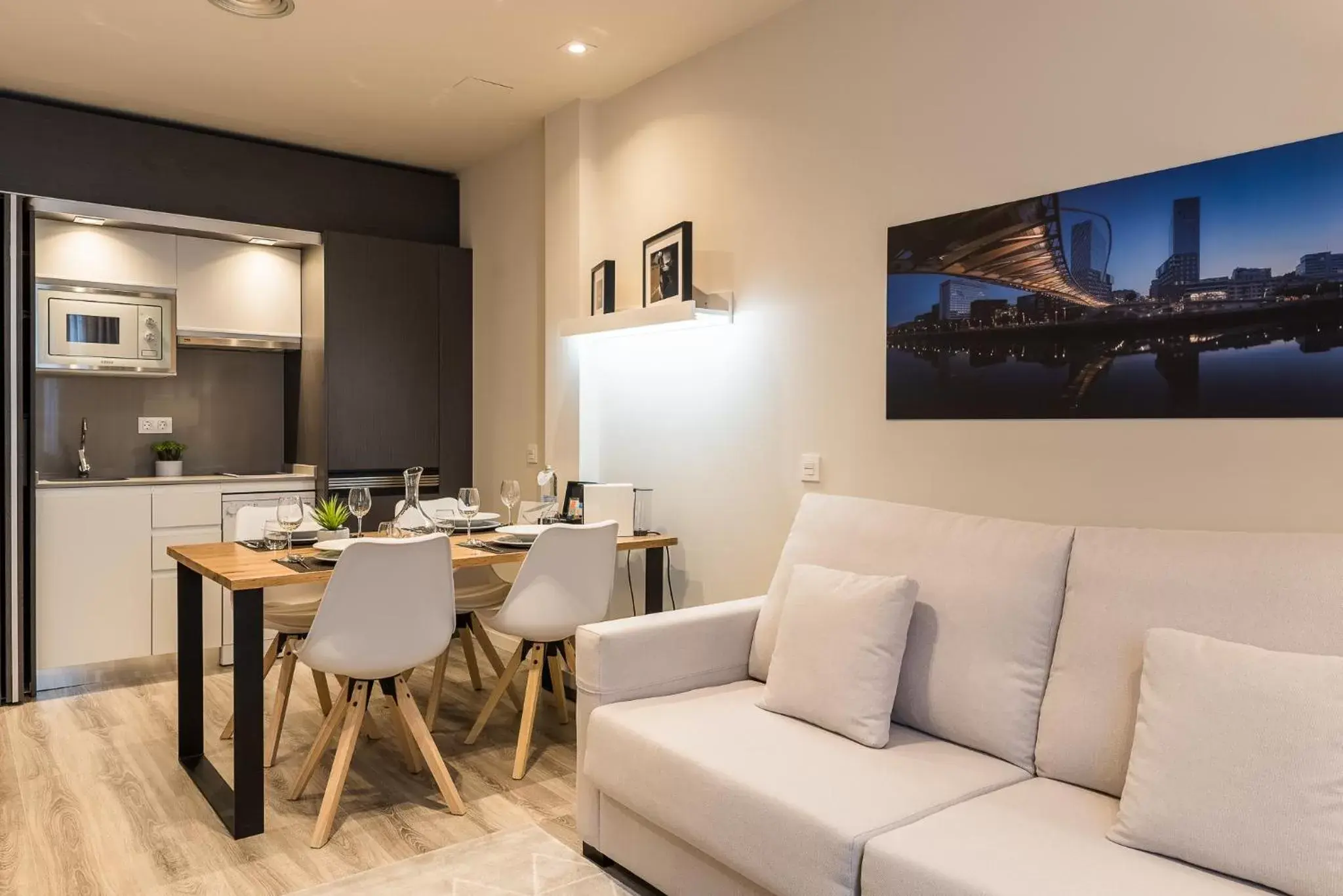 Kitchen or kitchenette, Seating Area in Bilbao City Center by abba Suites