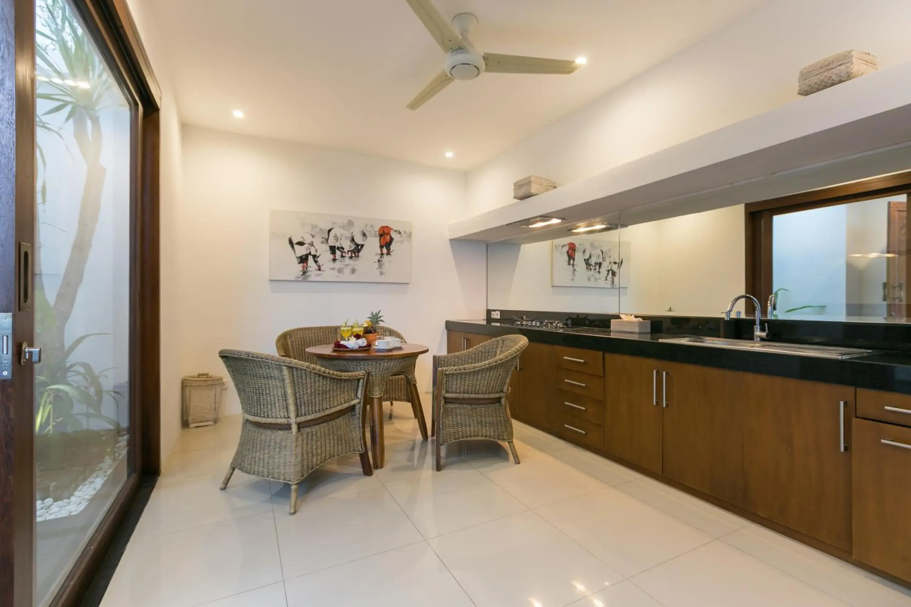 Living room, Kitchen/Kitchenette in Anari Villas Kuta                                                                         