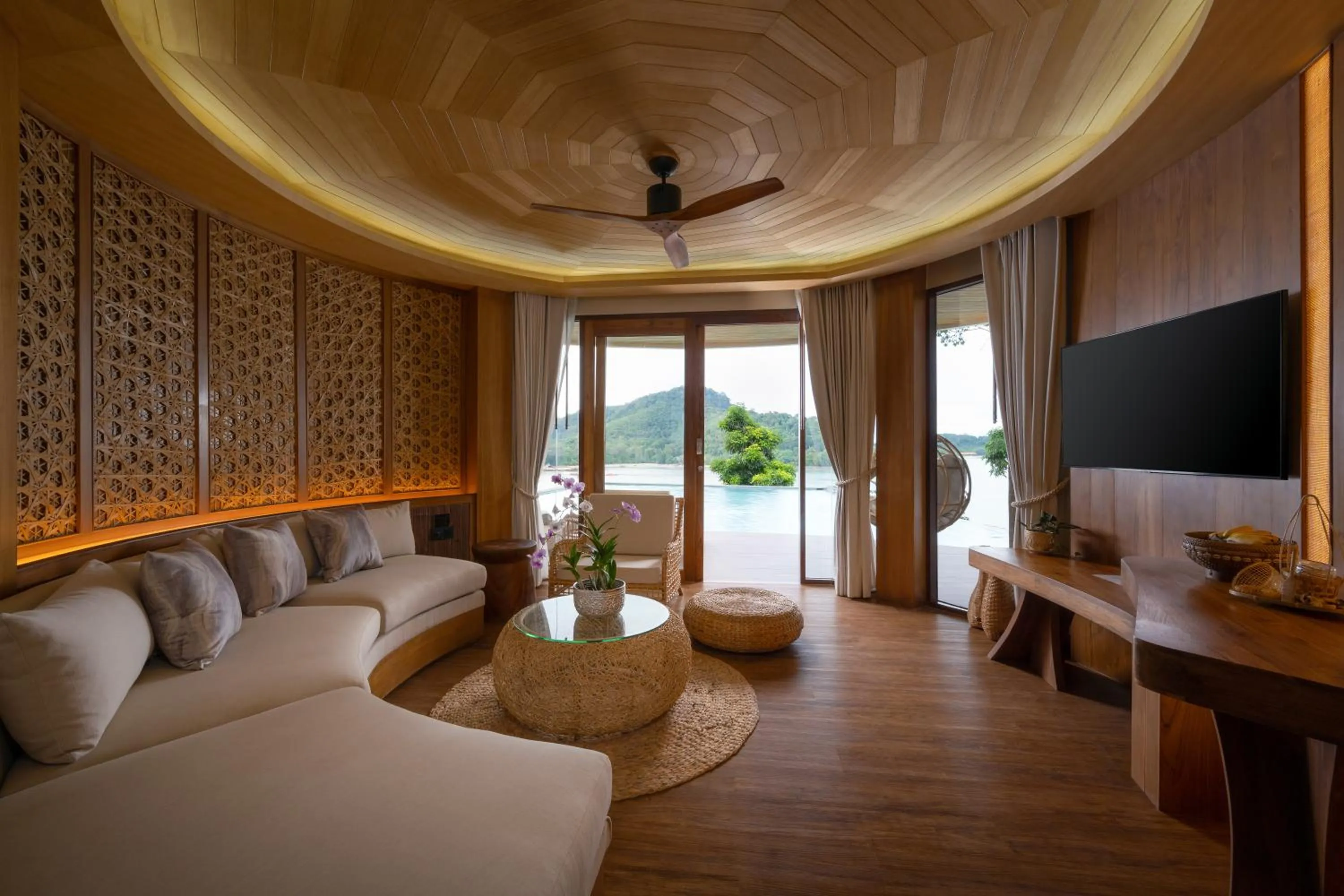 Communal lounge/ TV room in SINAE Phuket Luxury Hotel