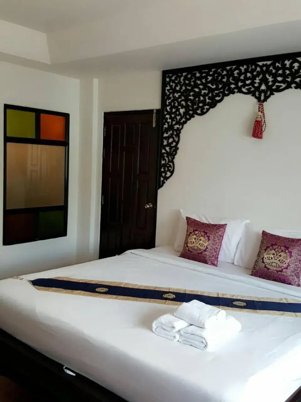 Bed in Wangburapa Grand Hotel