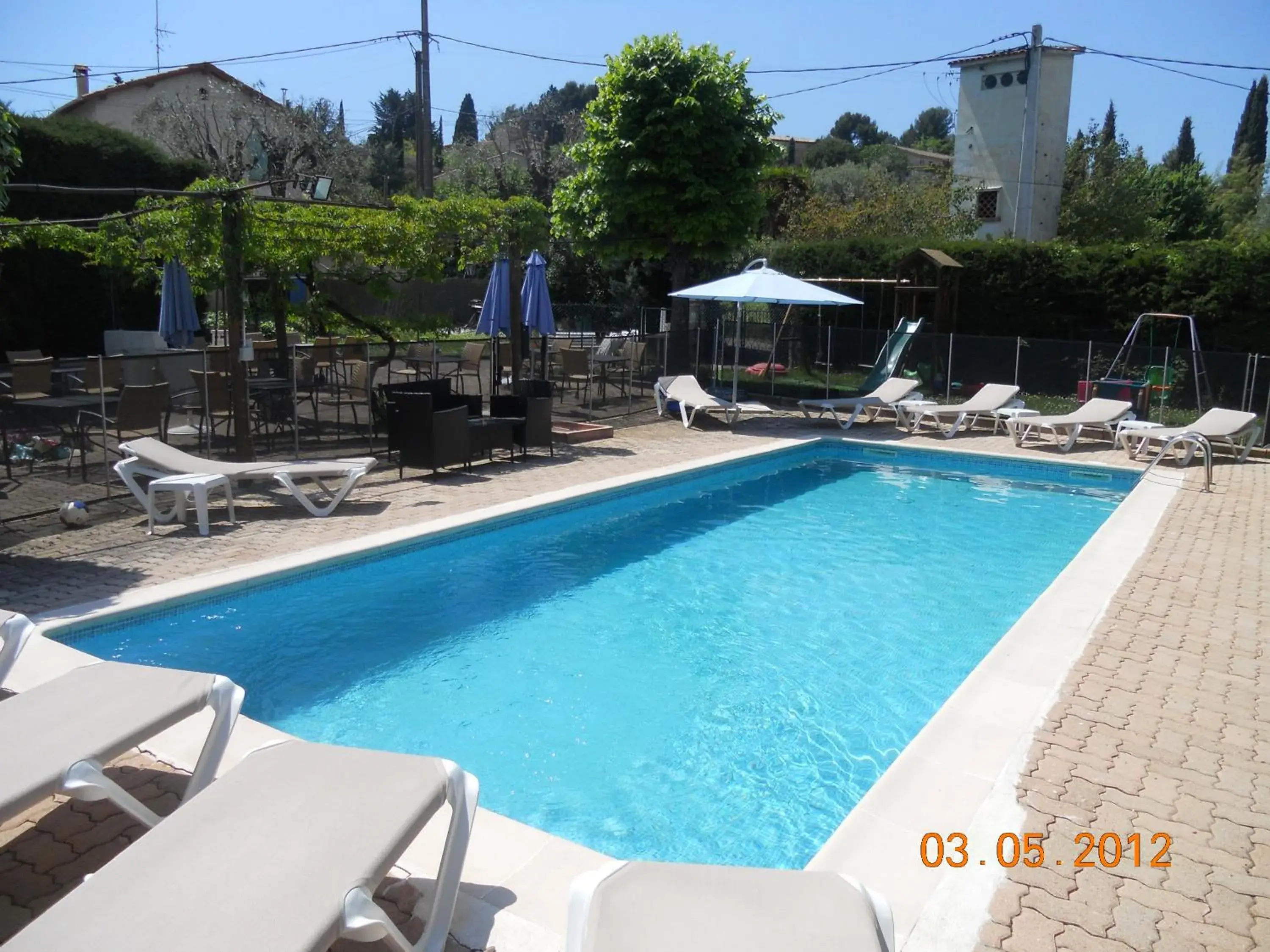 Swimming Pool in Logis Hotel des Cayrons