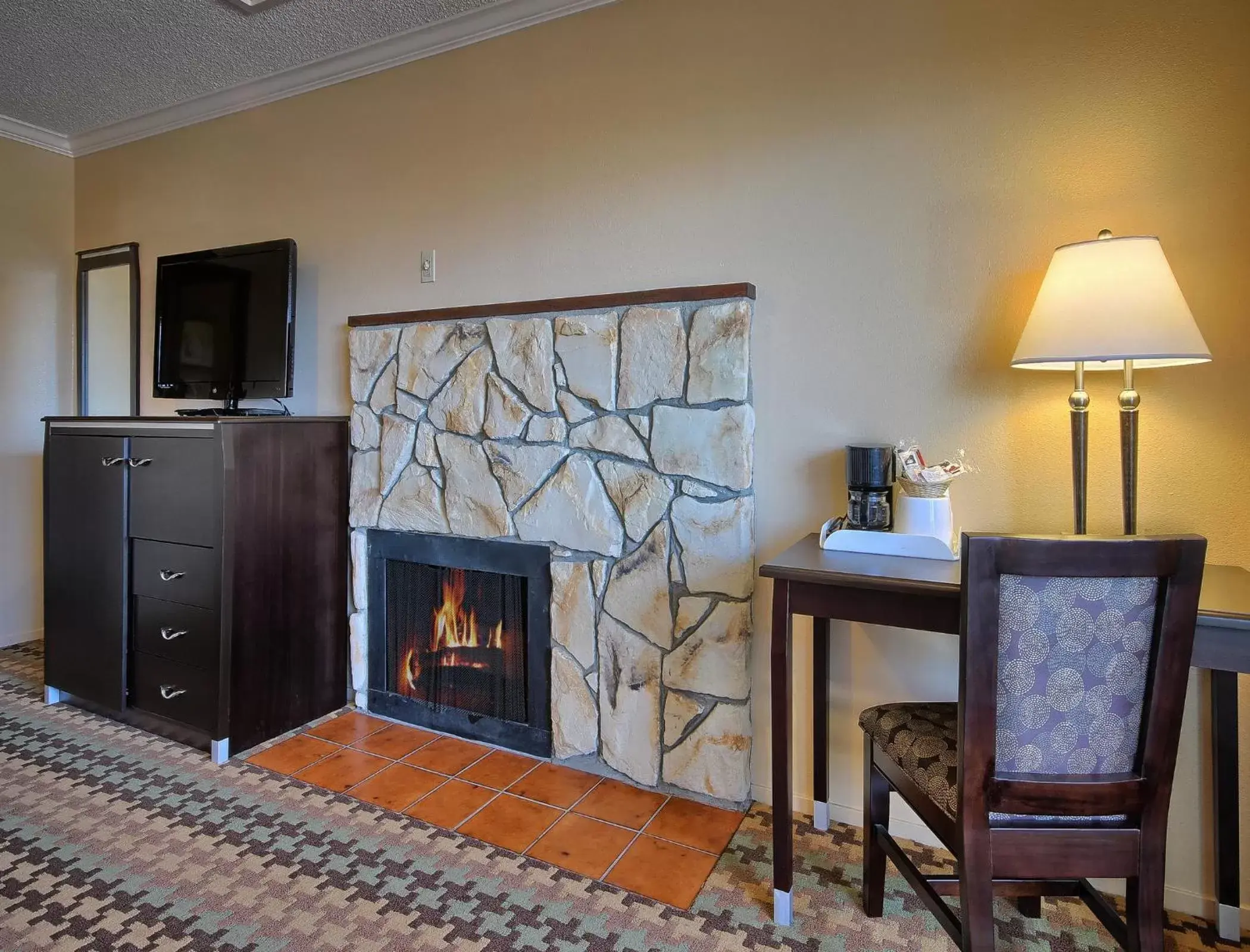 Photo of the whole room, TV/Entertainment Center in Silver Surf Motel