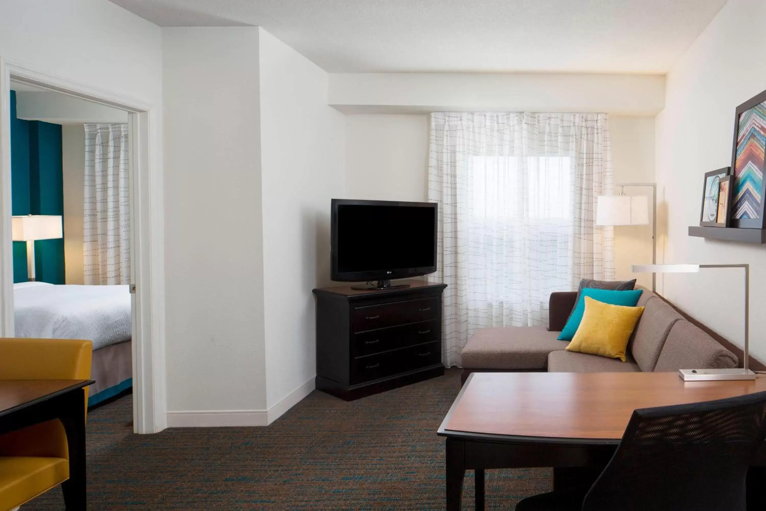 Bedroom, TV/Entertainment Center in Residence Inn by Marriott Orlando at SeaWorld