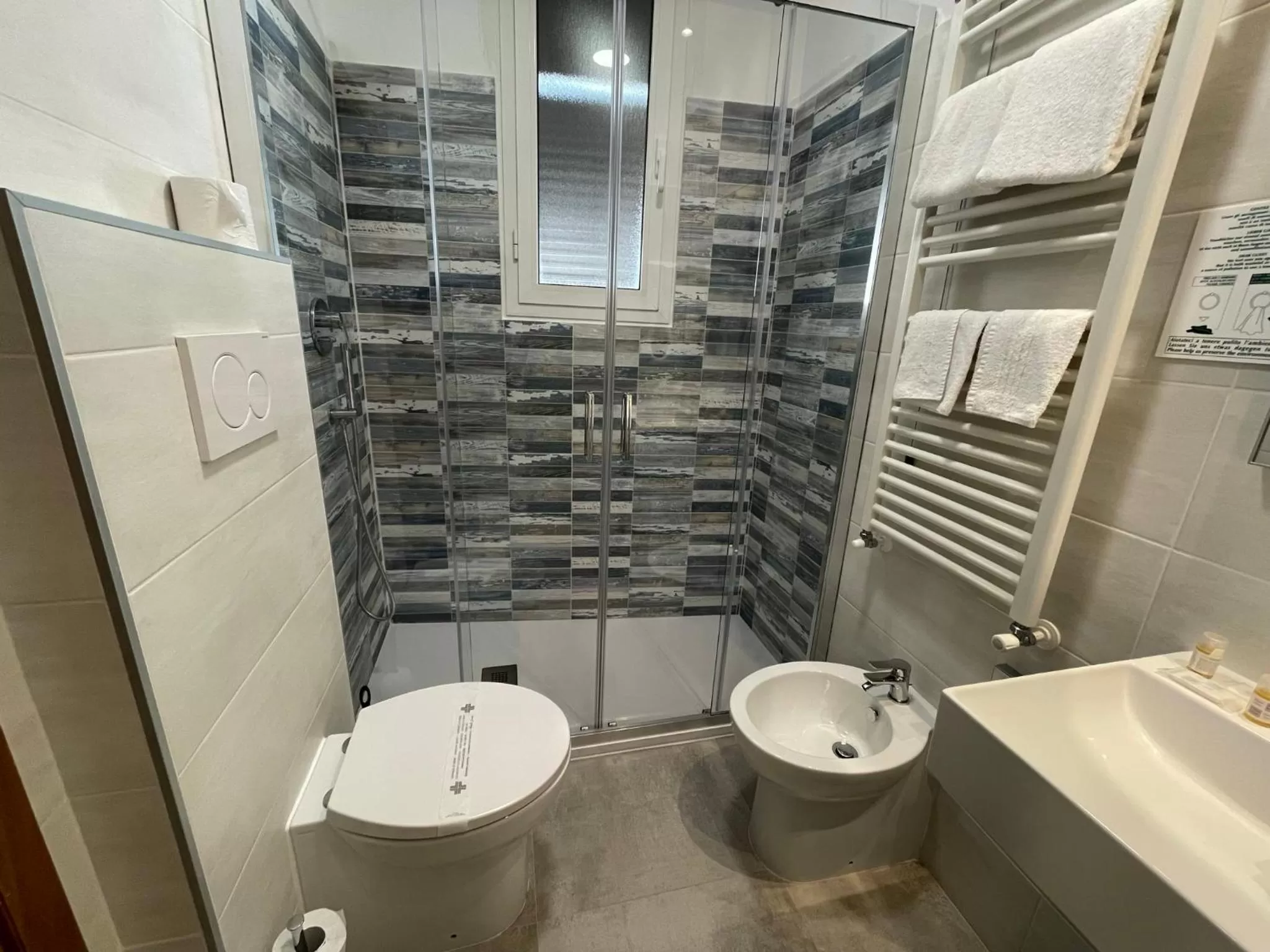 Bathroom in Coccodrillo Hotel & Apartments