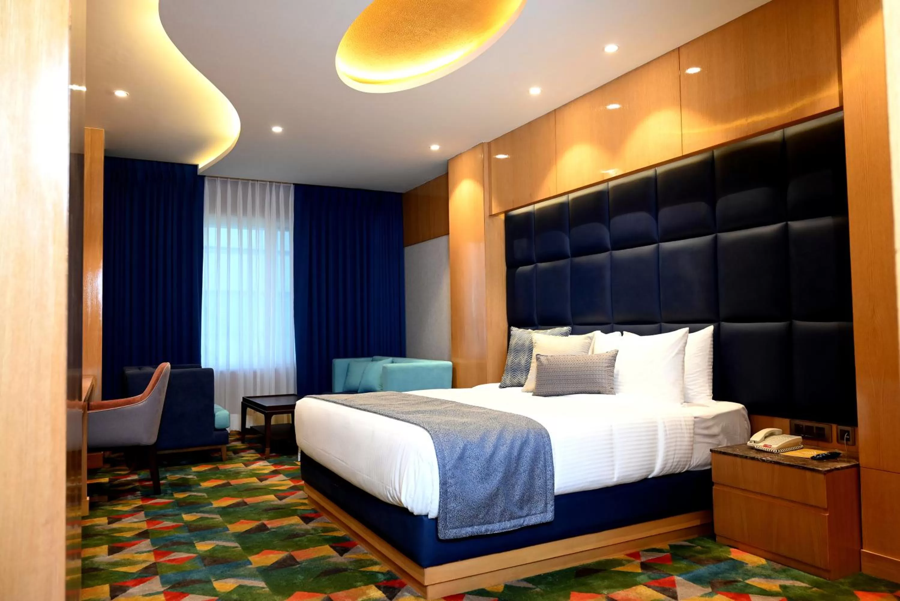 Photo of the whole room, Bed in Ramada Plaza by Wyndham Jammu Vijaypur