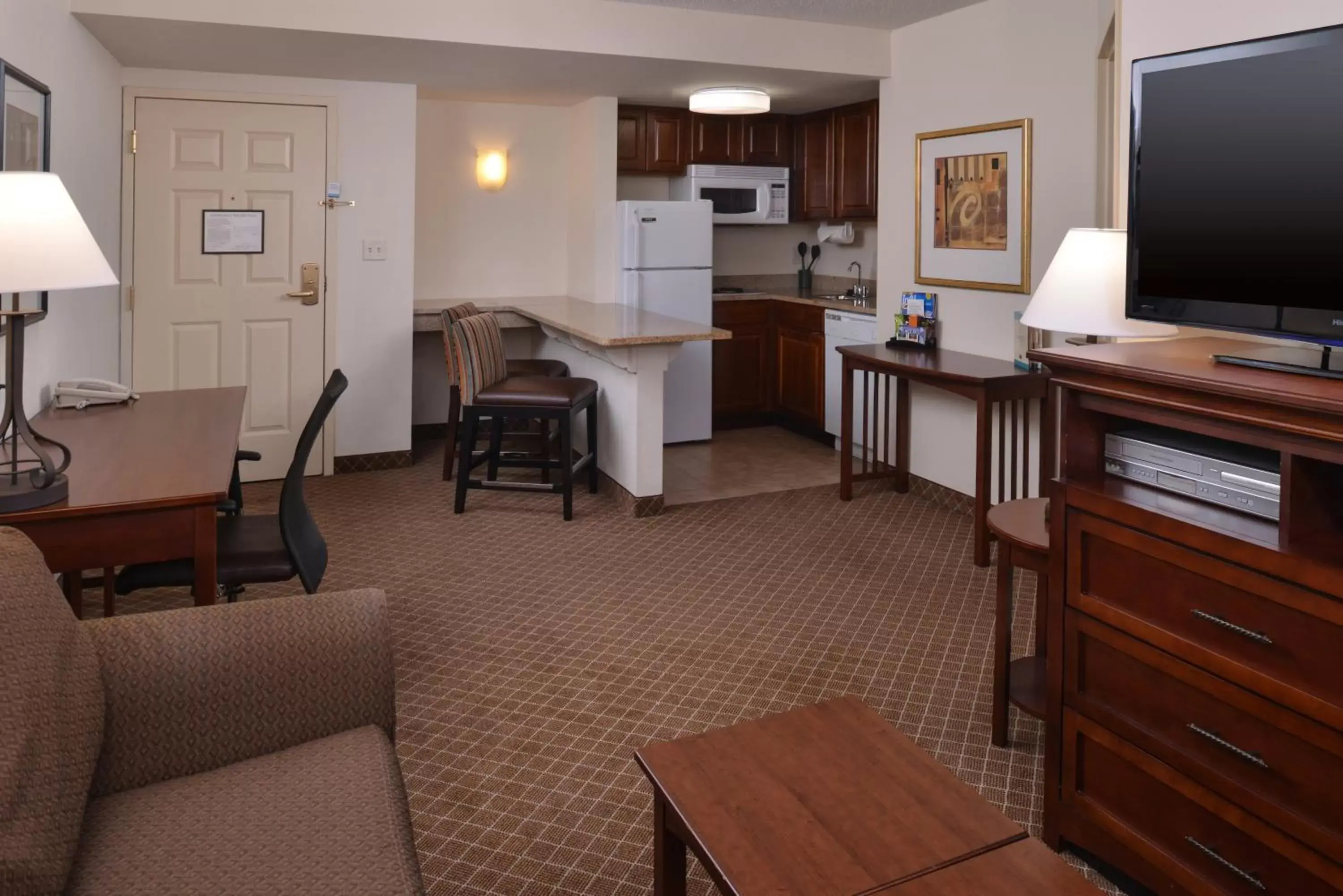 Photo of the whole room, TV/Entertainment Center in Staybridge Suites Indianapolis-Airport, an IHG Hotel