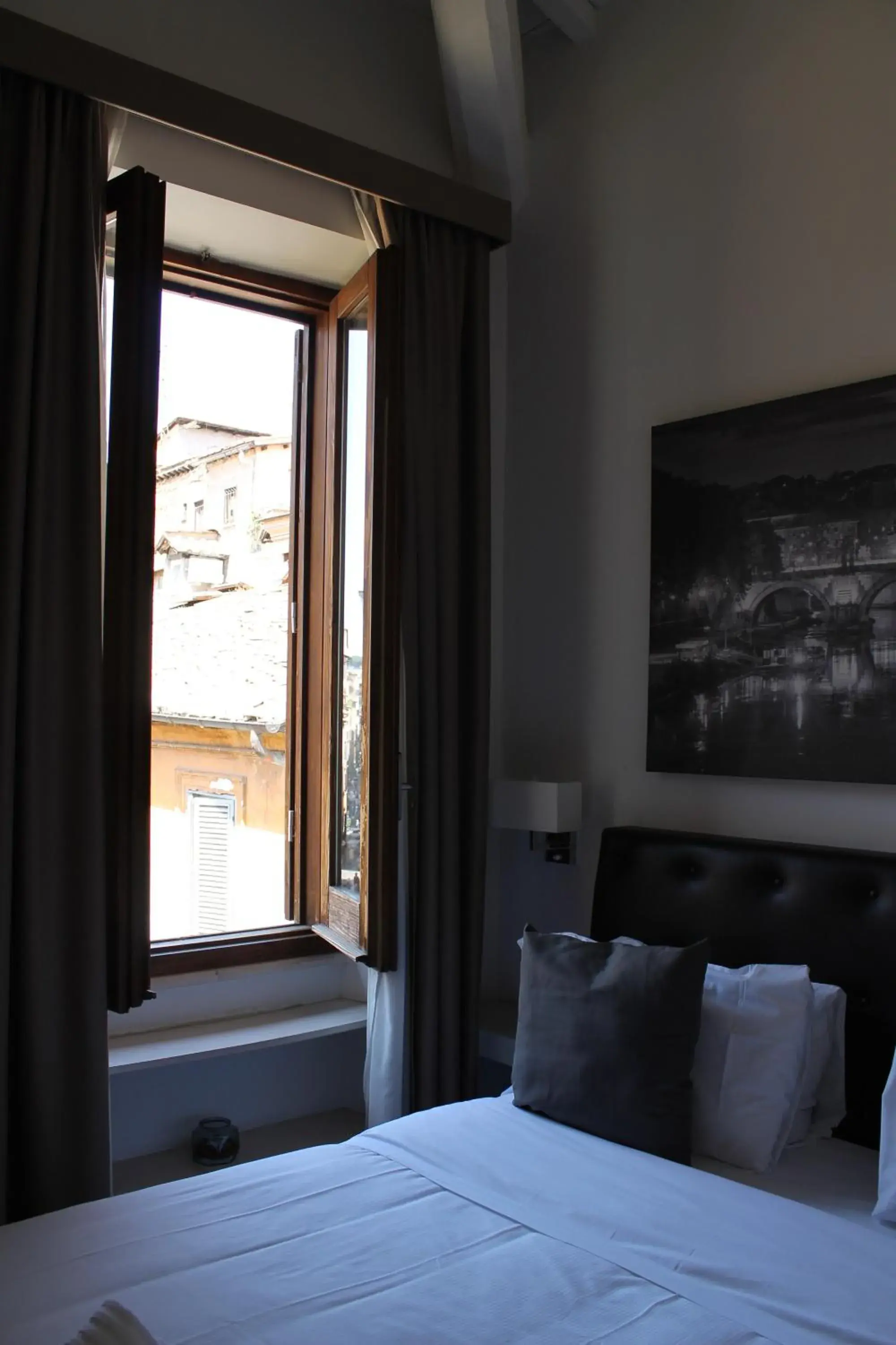 Photo of the whole room, Bed in Relais Arco Della Pace
