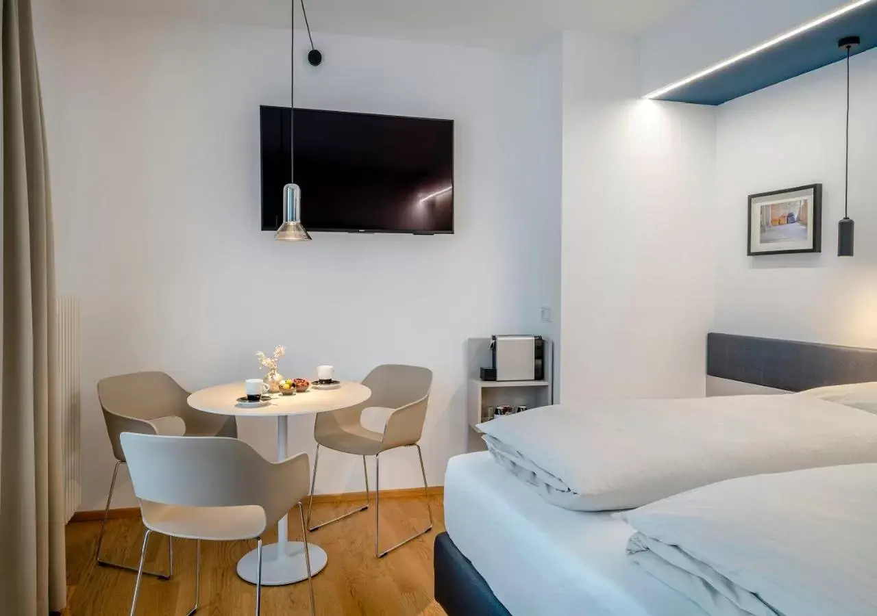 TV and multimedia, Bed in Boutique Hotel Hauser
