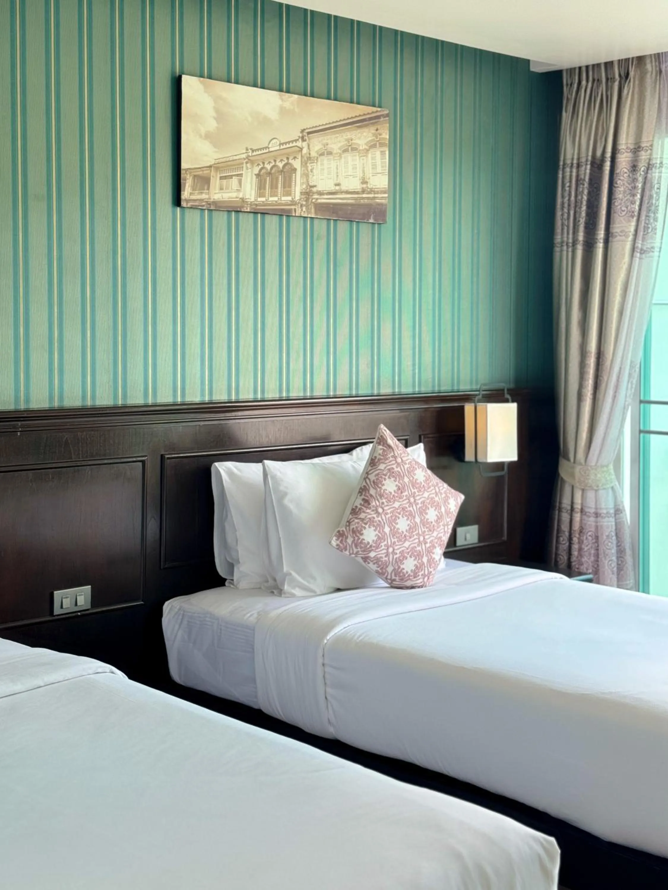 Bed in Grand Supicha City Hotel