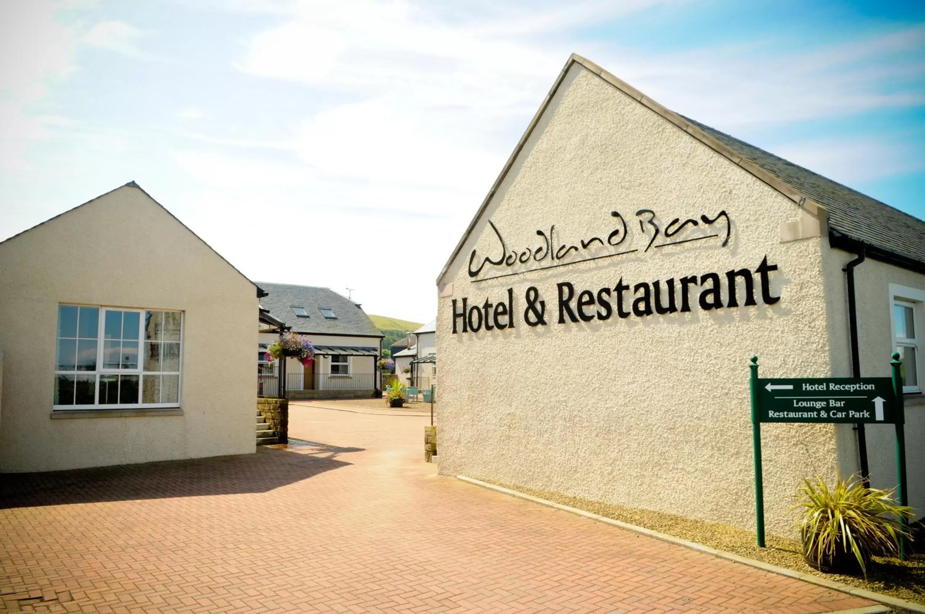 Patio, Property Logo/Sign in Woodland Bay Hotel