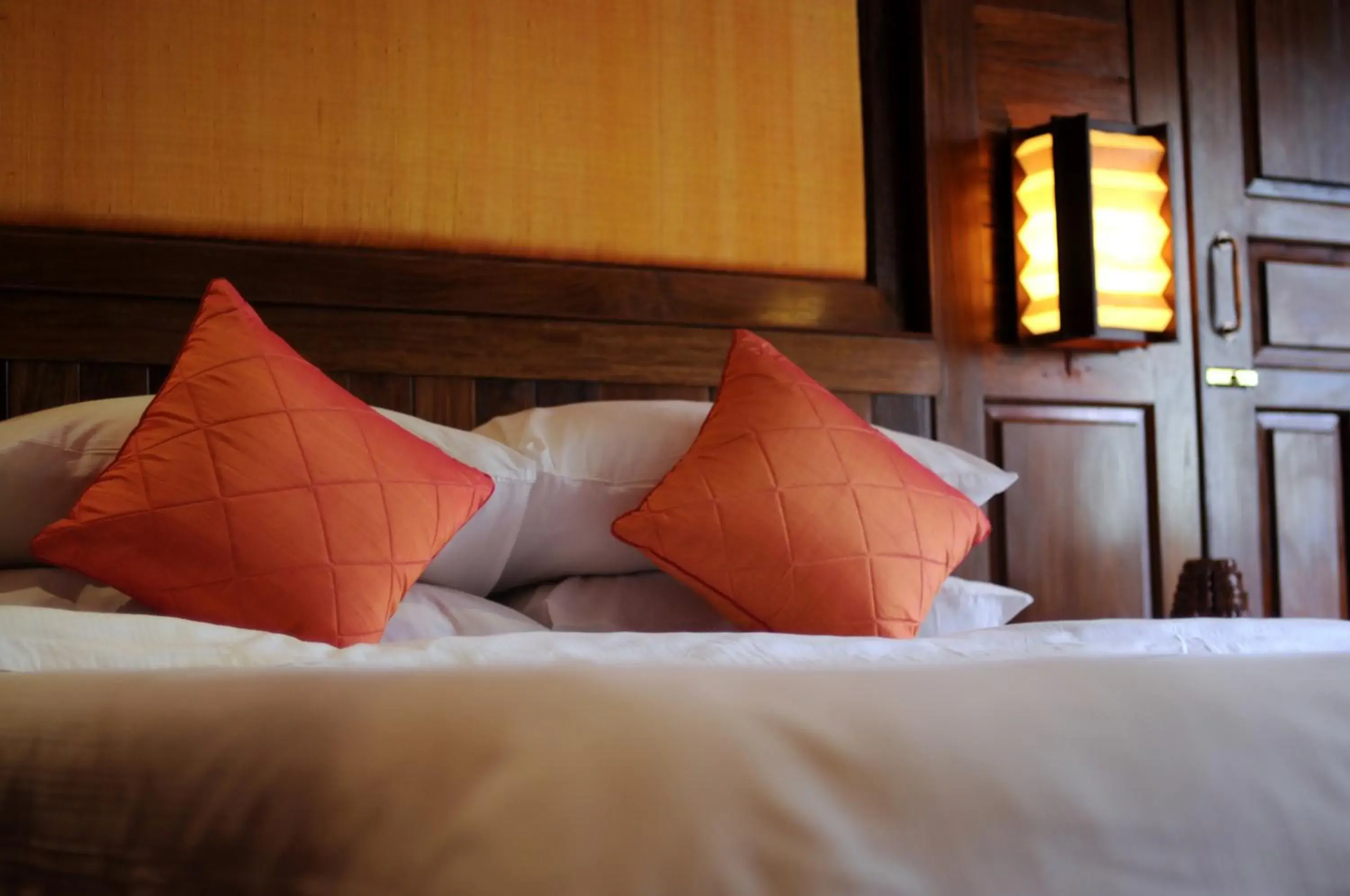 Bed in Empress Angkor Resort & Spa