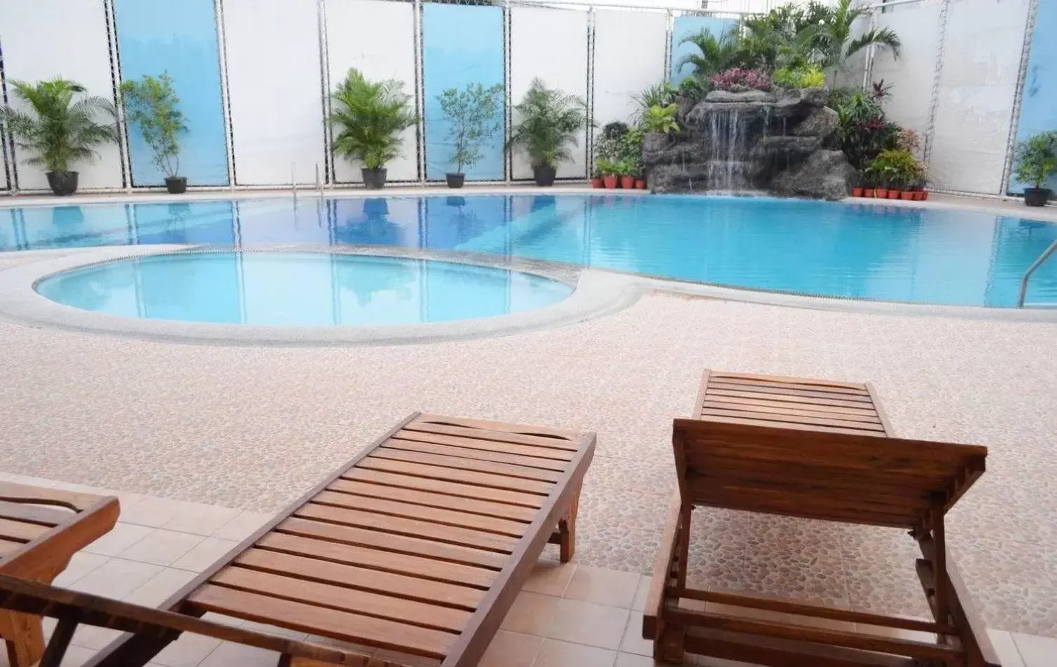 Swimming Pool in Bossotel Chiang Mai - SHA Plus