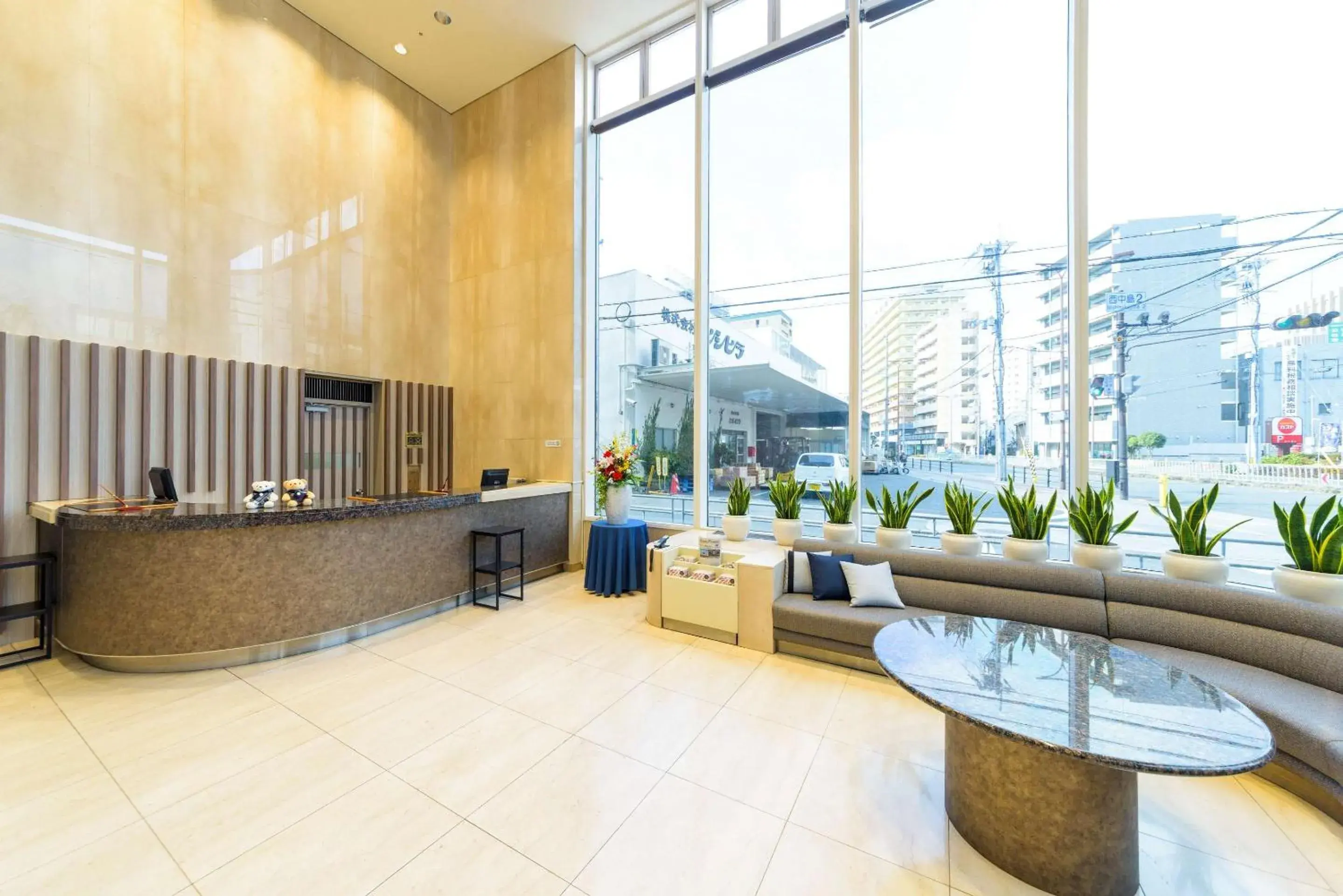 Lobby or reception in SureStay Plus Hotel by Best Western Shin-Osaka