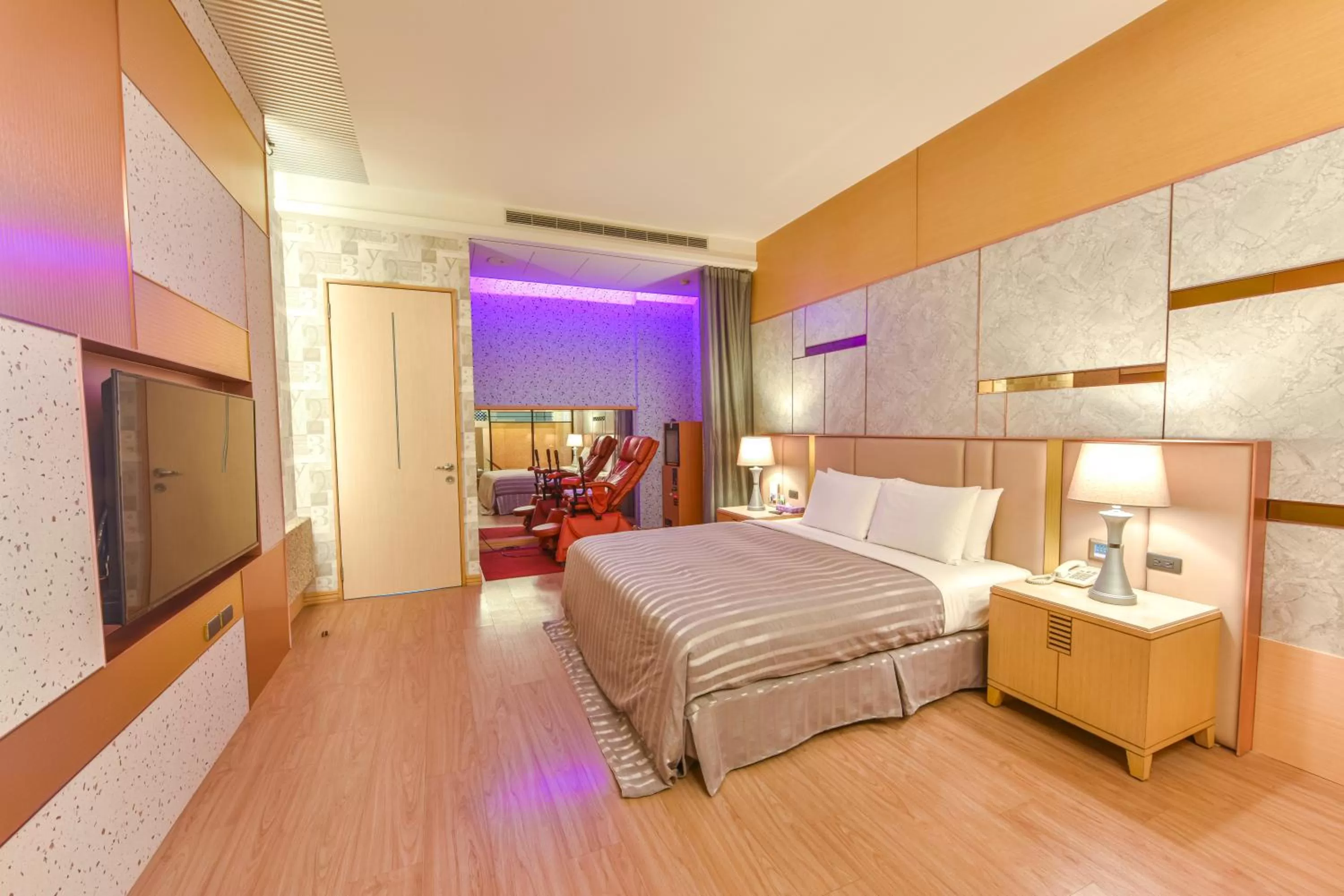 Bed in Purple Garden Motel