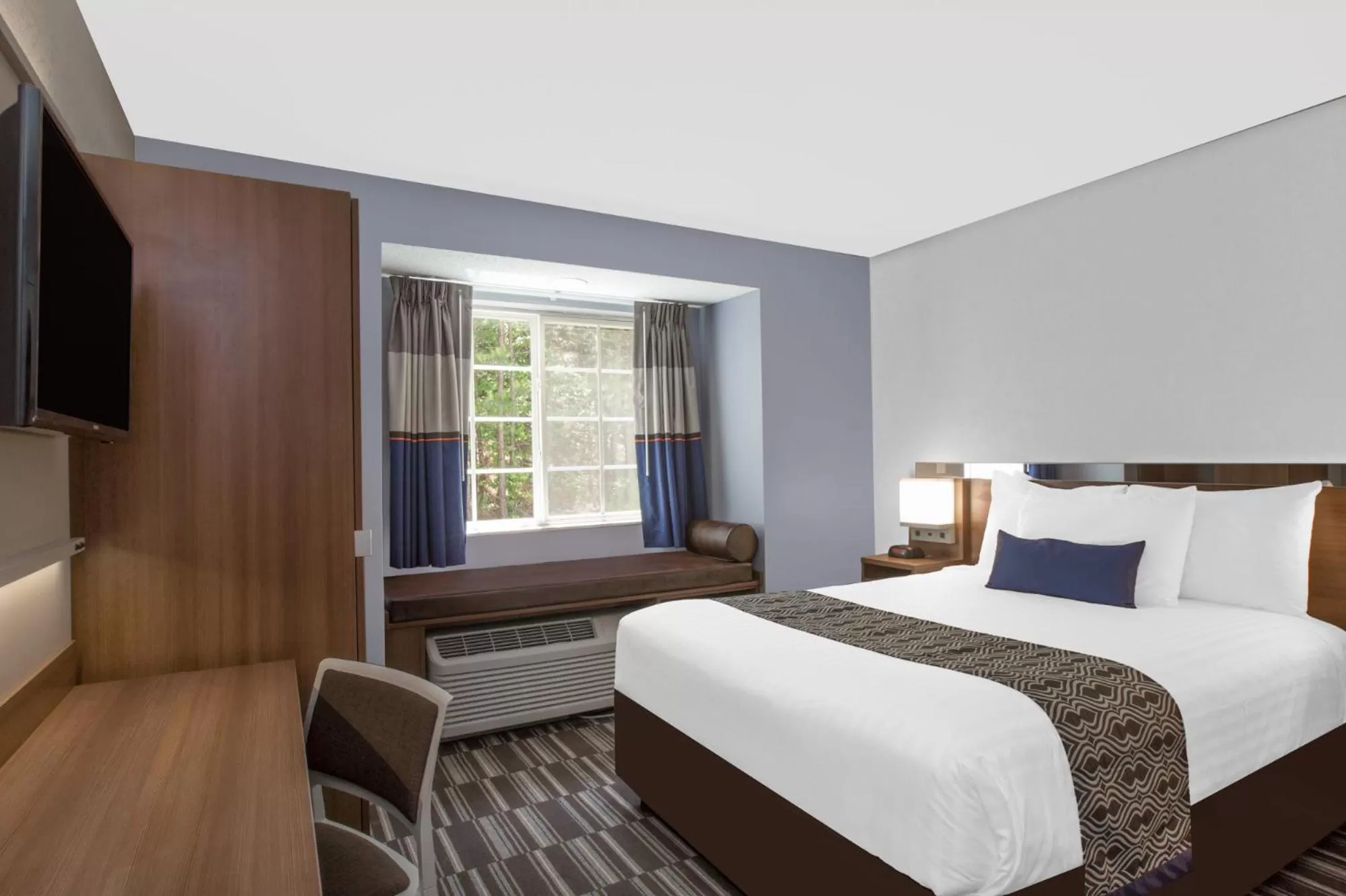 Bedroom in Microtel Inn & Suites by Wyndham Gardendale - Birmingham North