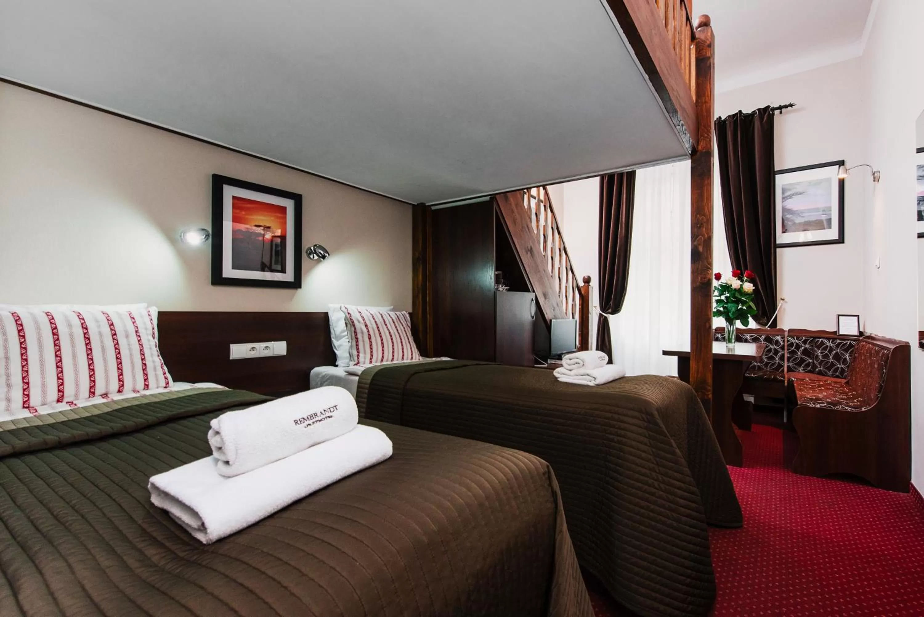 Bed in Rembrandt Aparthotel