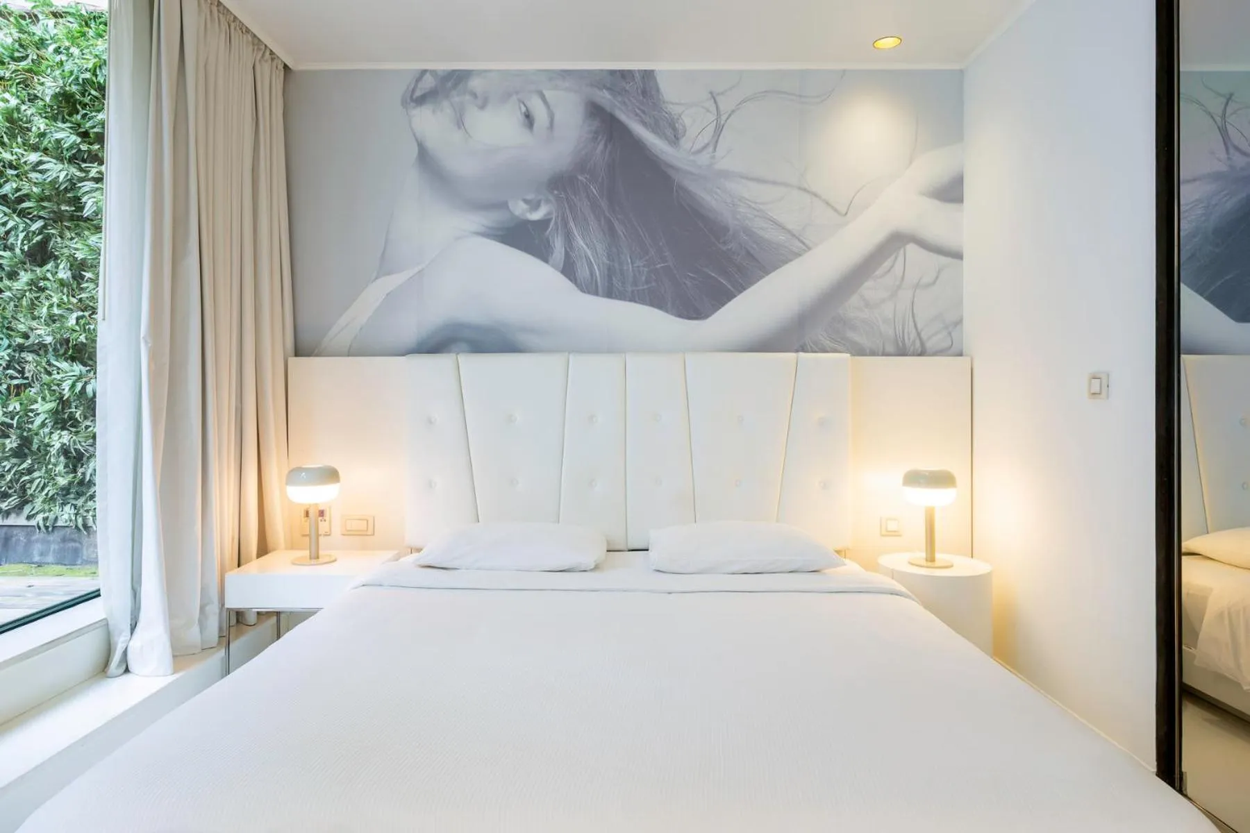 Bed in B-aparthotel Regent