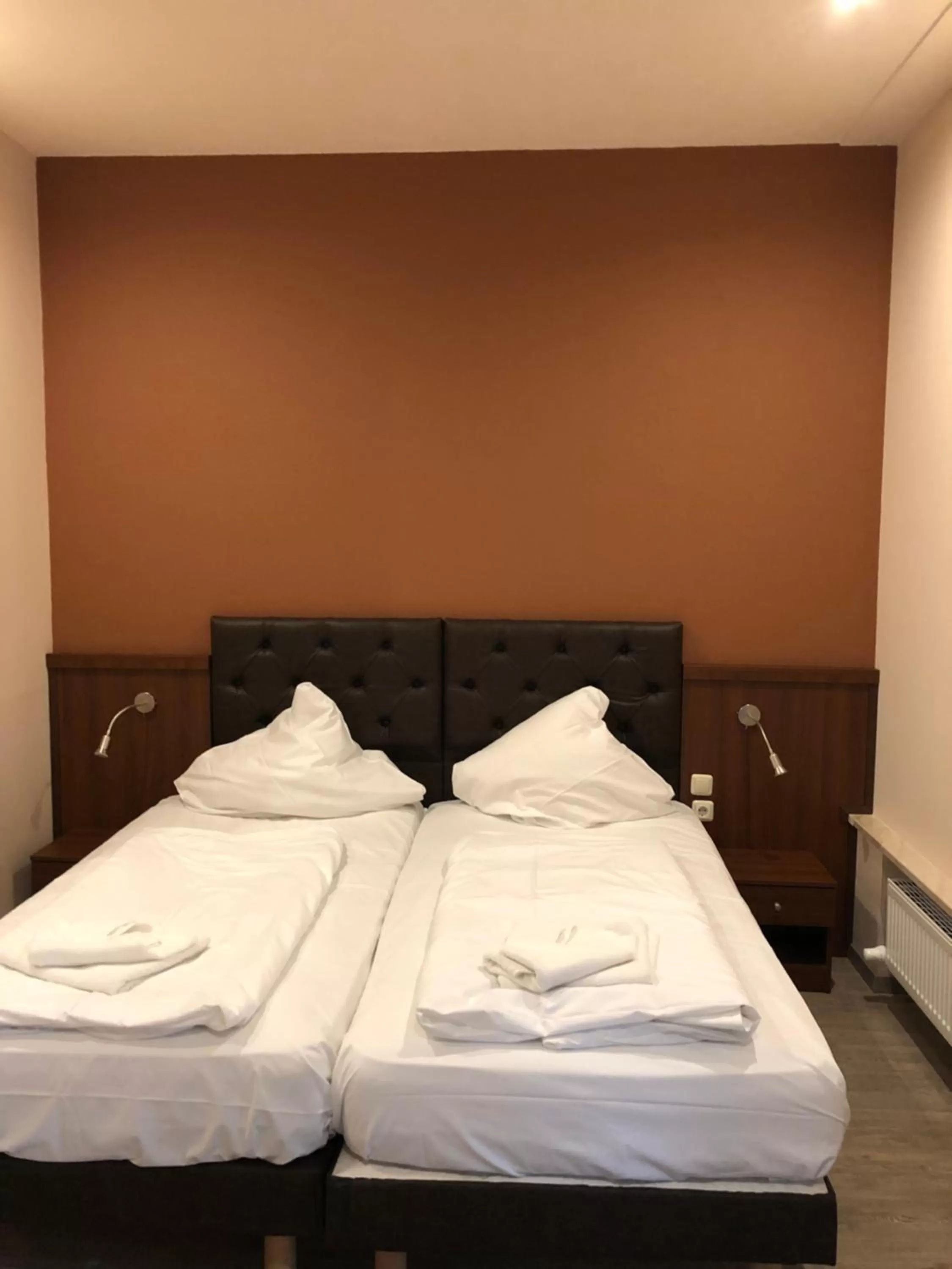 Bed in Hotel Poseidon