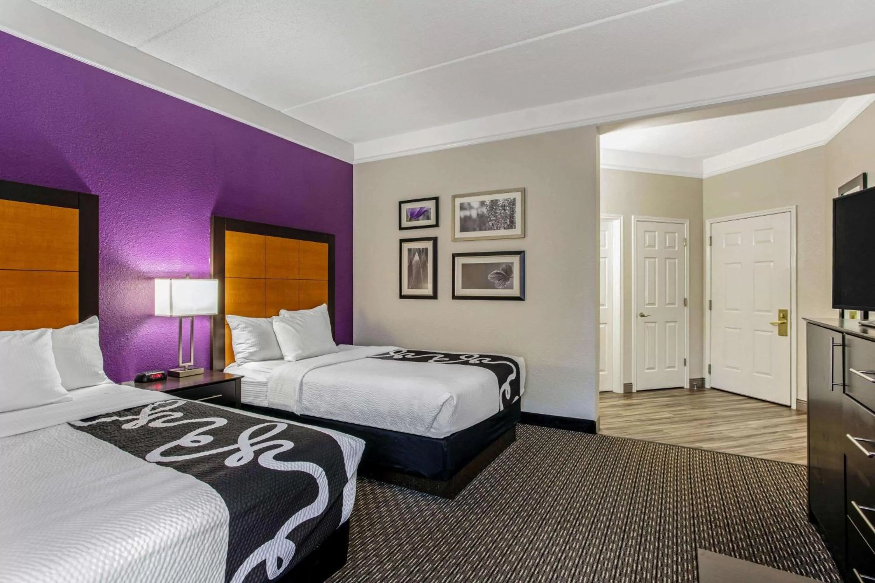 Photo of the whole room, Bed in La Quinta by Wyndham Orlando Airport North - Free Airport Shuttle!