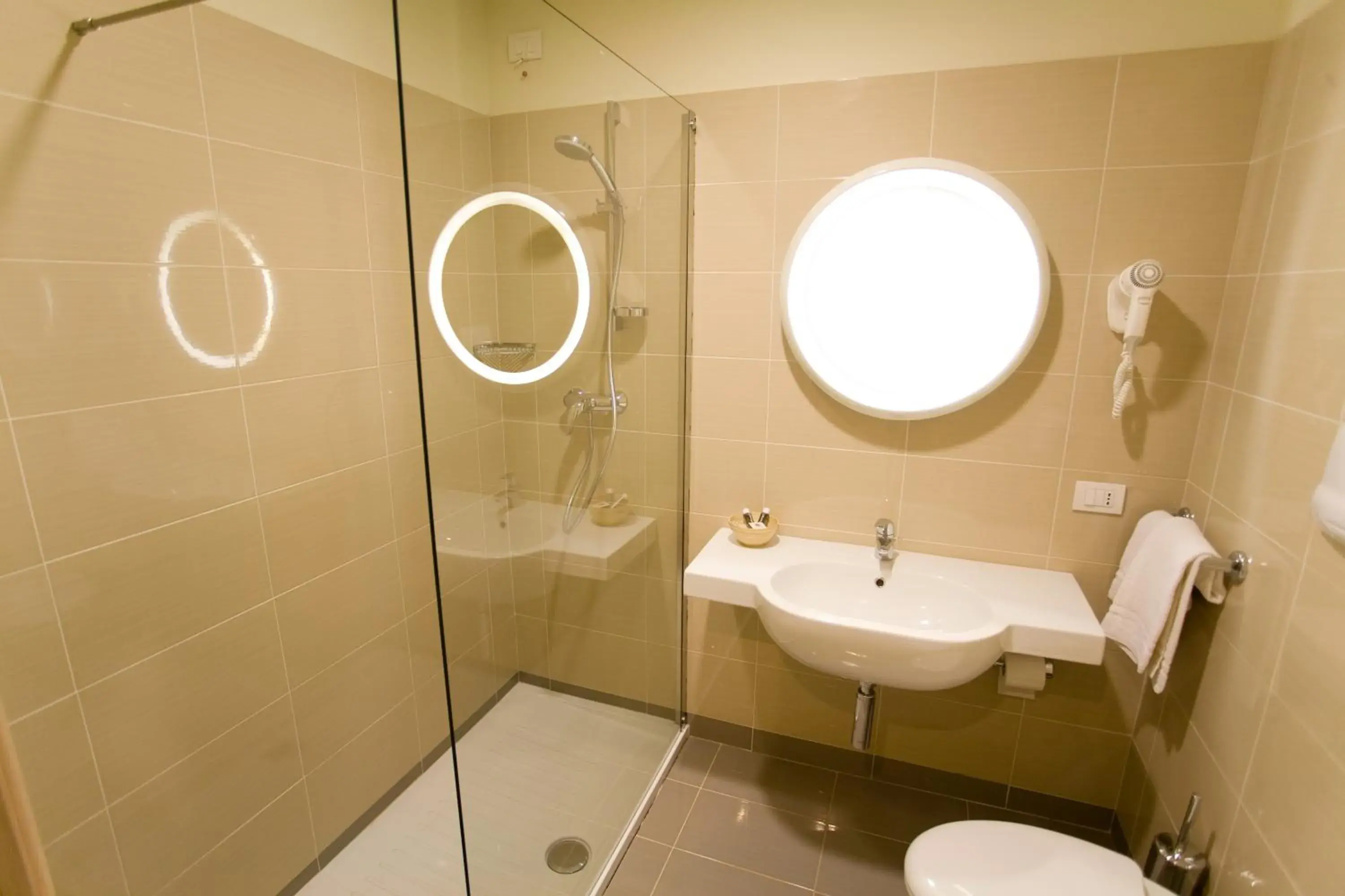 Bathroom in Regal Hotel & Residence