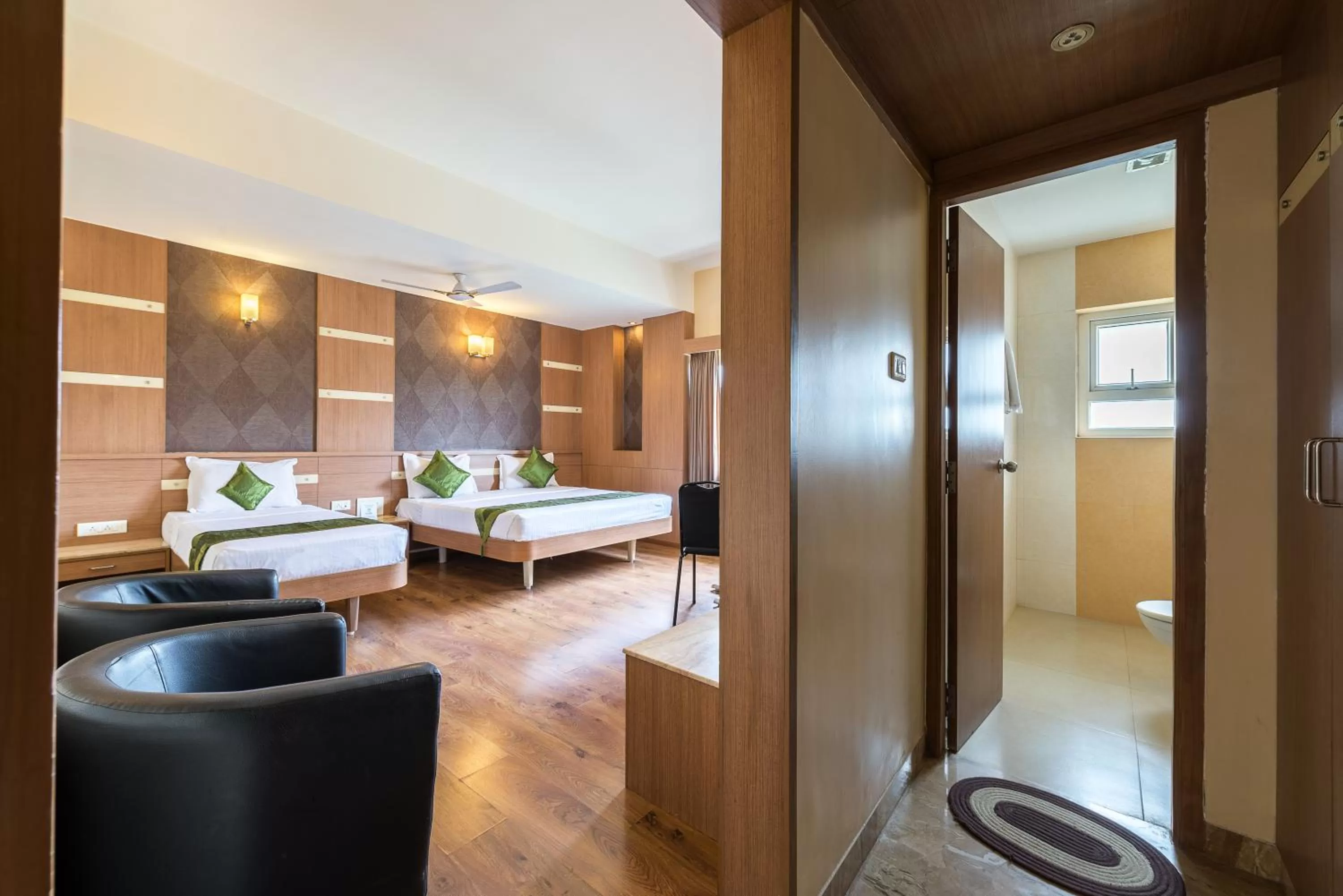 Photo of the whole room, Bed in Treebo ESS Grande