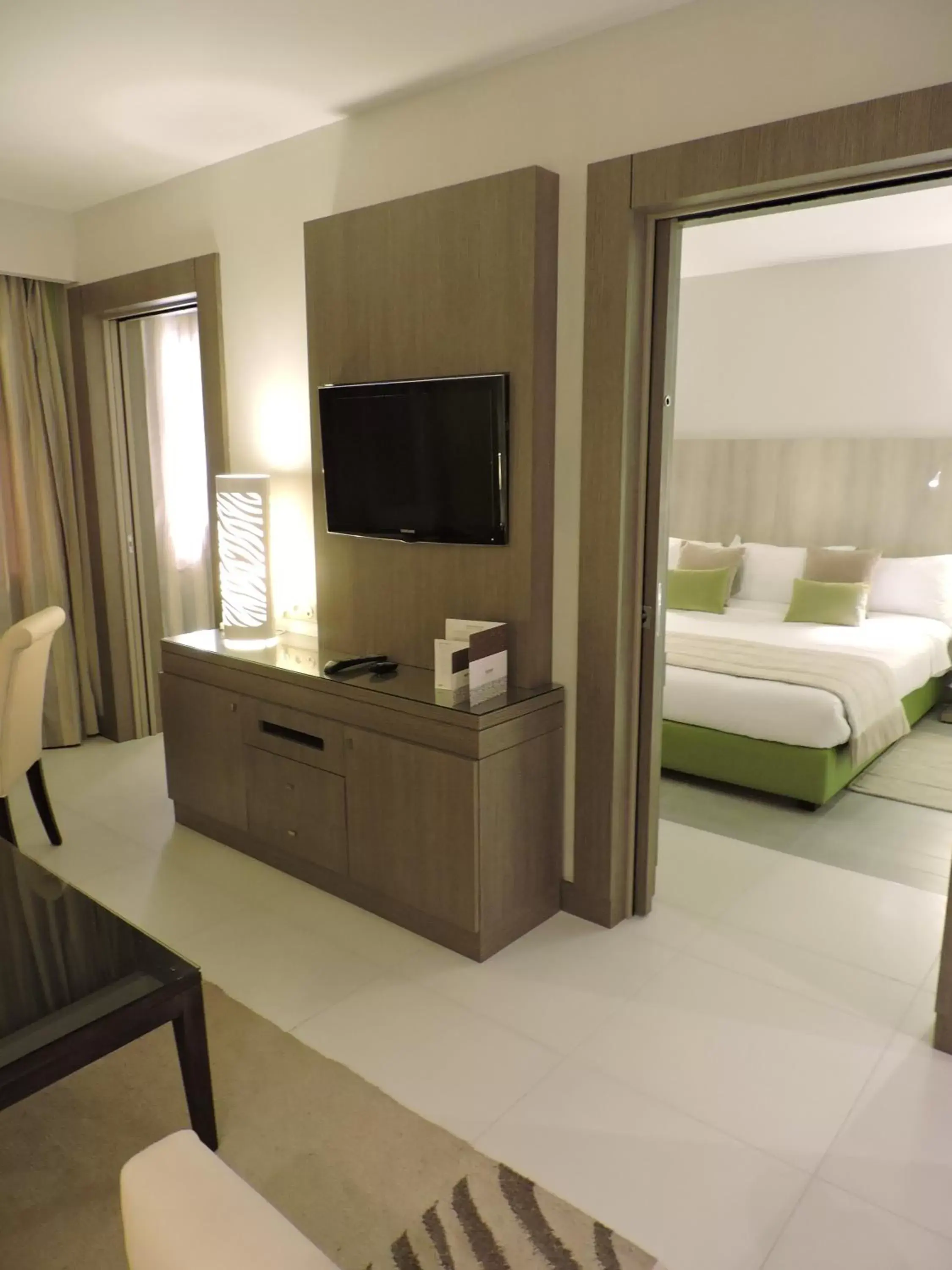 TV and multimedia, TV/Entertainment Center in Golf Royal Hotel
