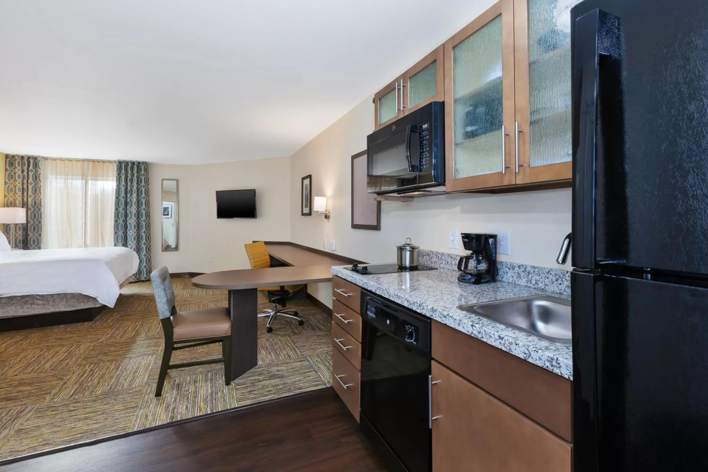 Kitchen/Kitchenette in Candlewood Suites Louisville - NE Downtown Area, an IHG Hotel