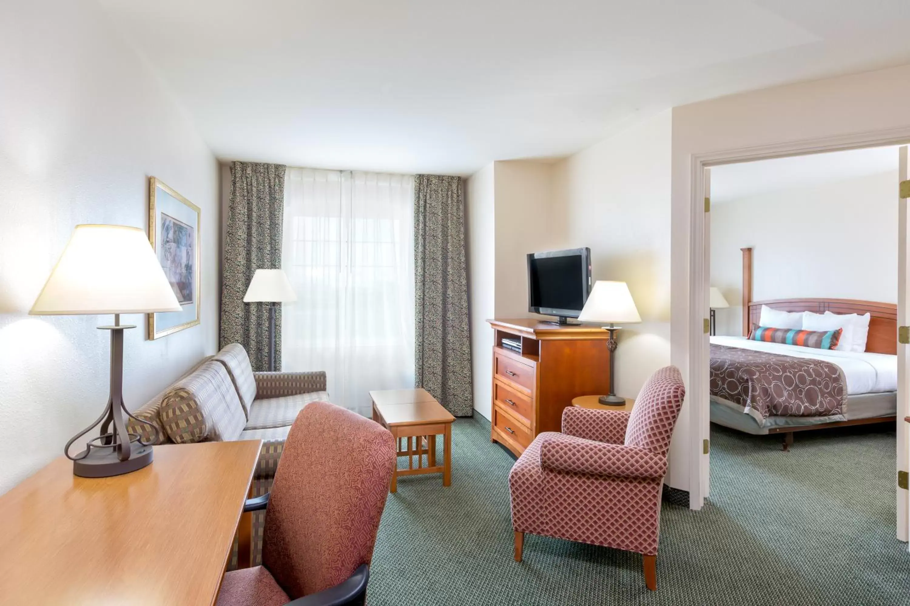 Bedroom, Seating Area in Staybridge Suites - Brownsville, an IHG Hotel