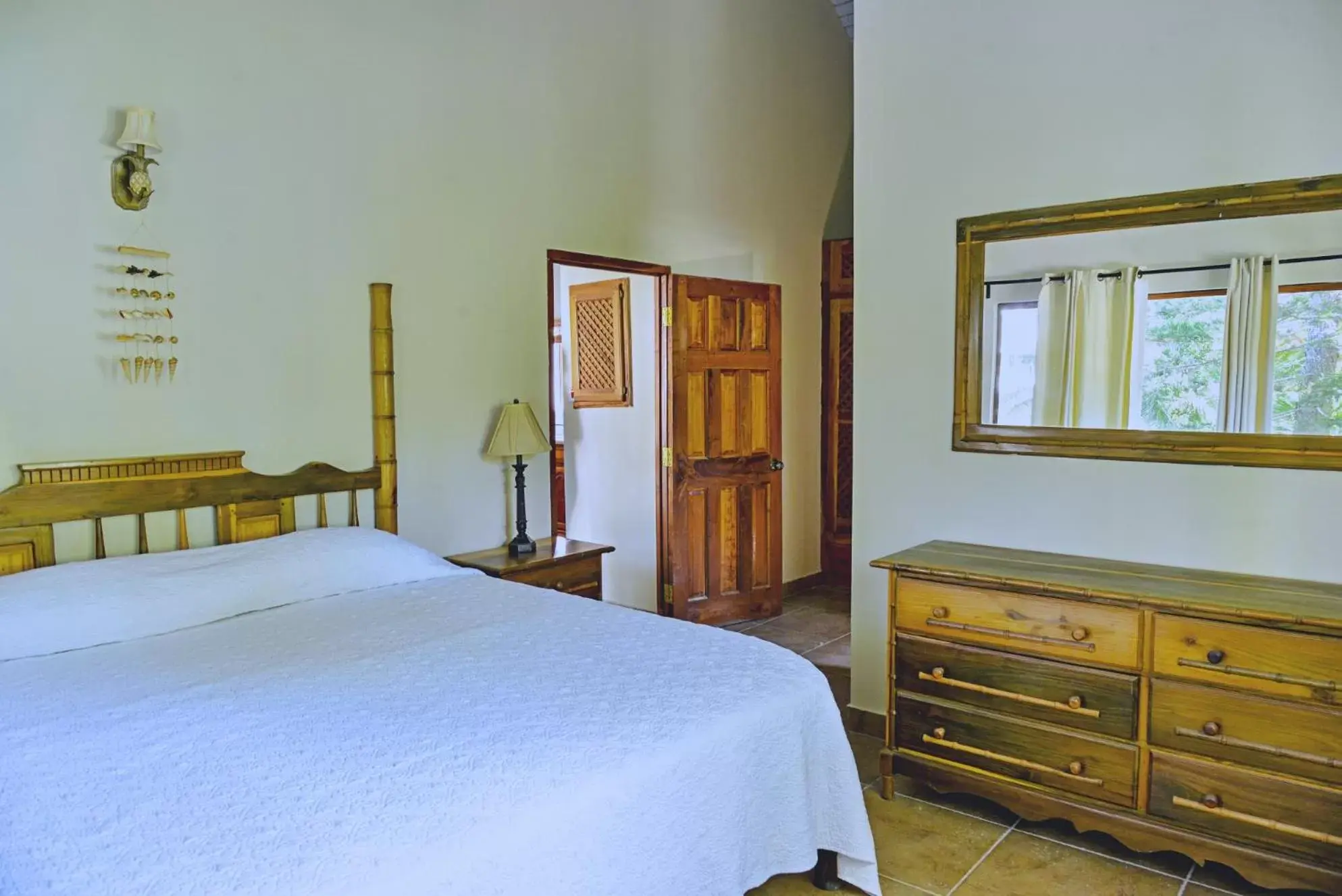 Bedroom, Bed in Beach House Condos, Negril