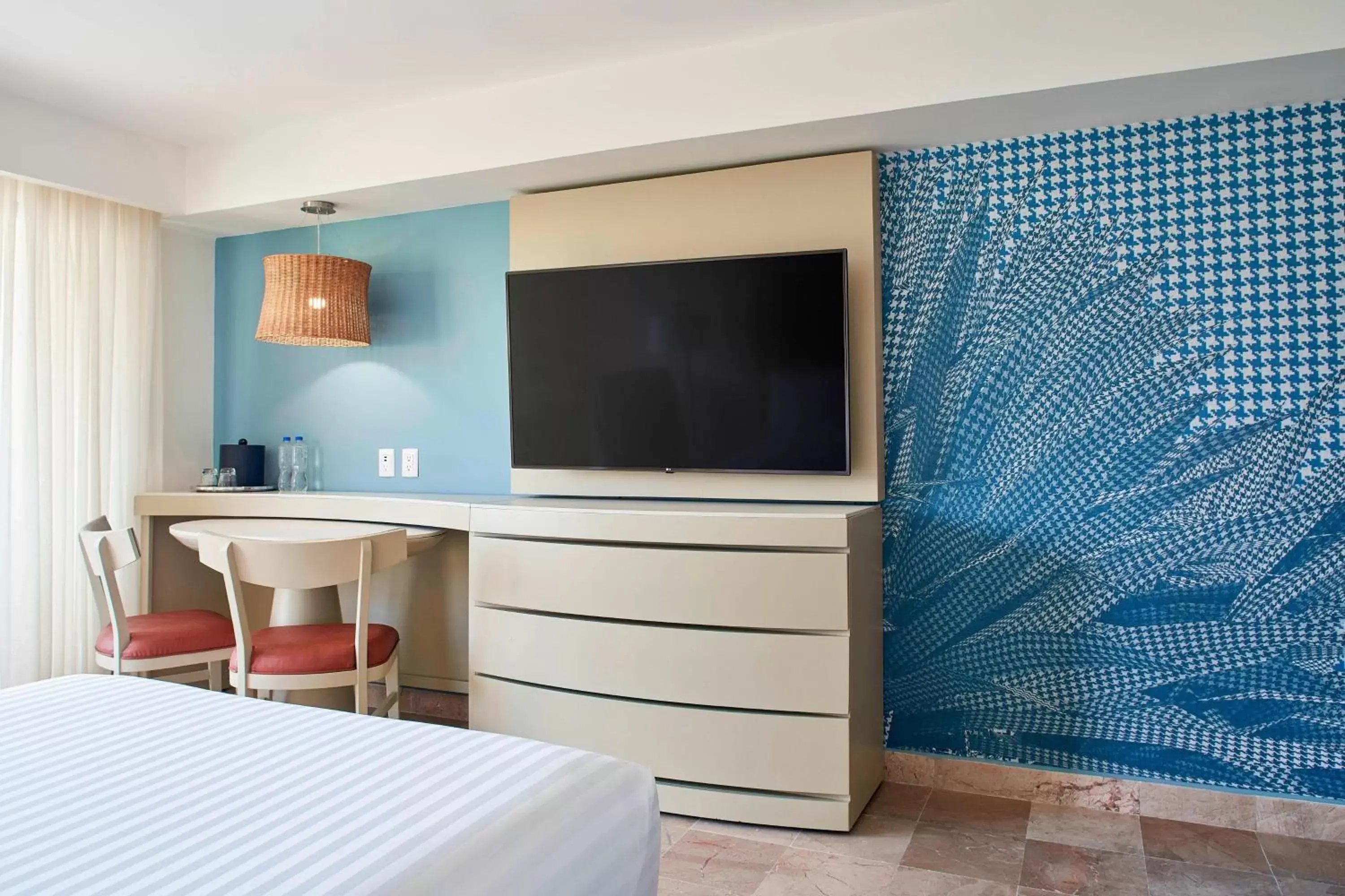 Photo of the whole room, TV/Entertainment Center in Marriott Puerto Vallarta Resort & Spa