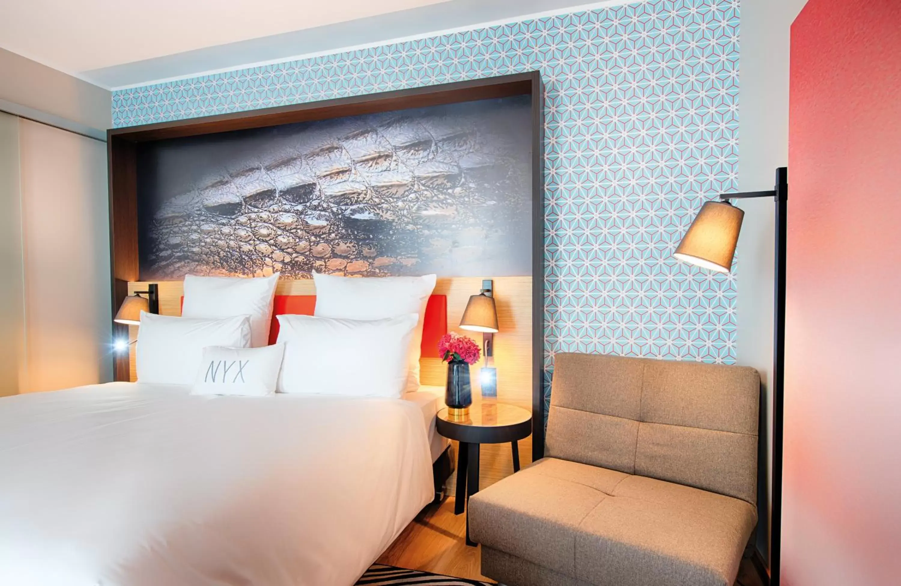 Photo of the whole room, Bed in NYX Hotel Munich by Leonardo Hotels
