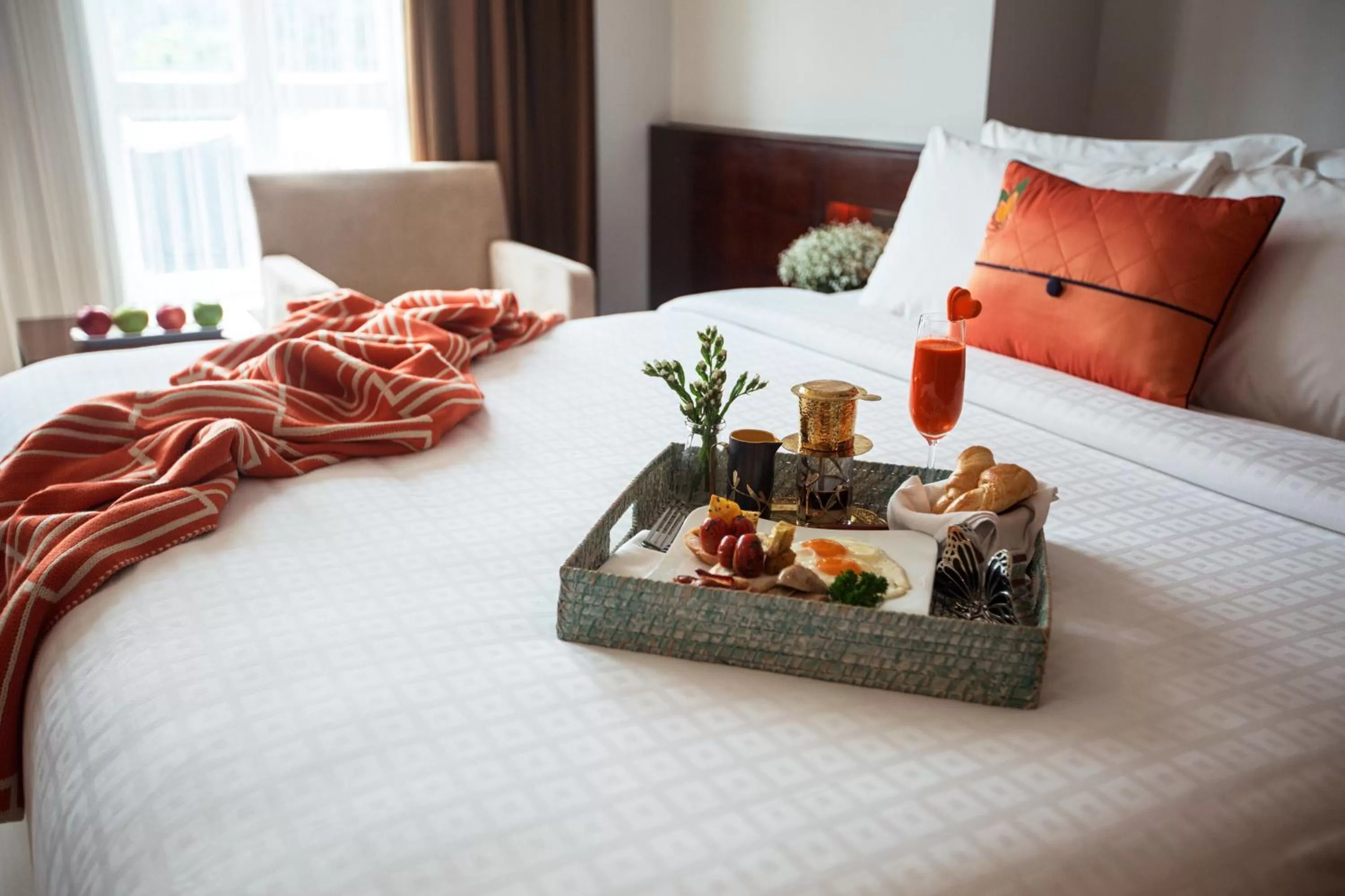 Bed in Sanouva Saigon Hotel