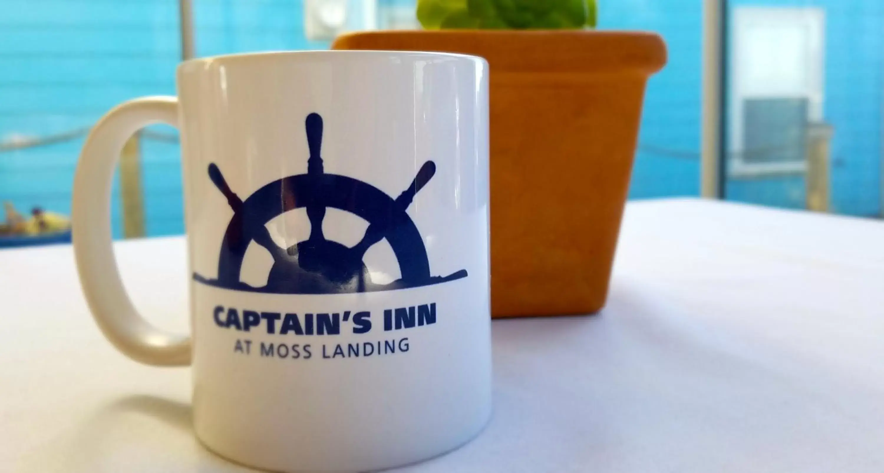 Property logo or sign in Captain's Inn at Moss Landing