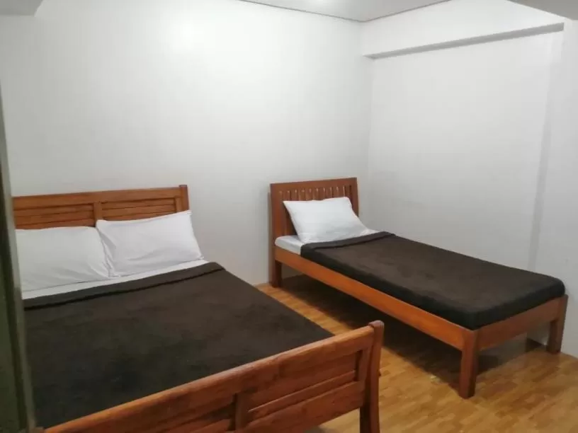 Bed in The Half House by Elmar Cabin