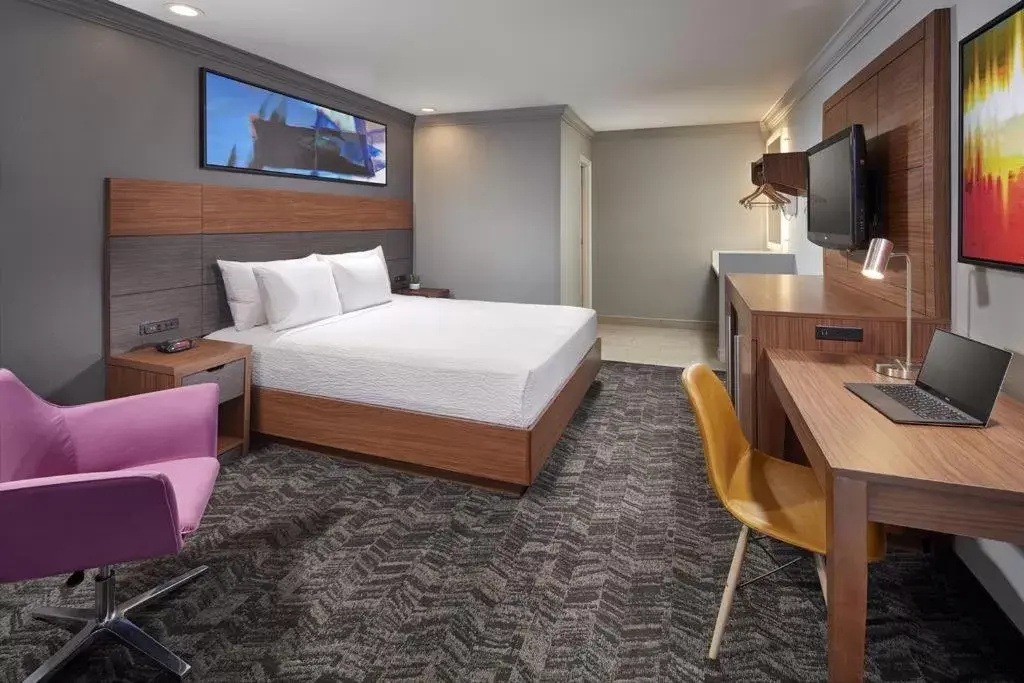 Bed in Studio Inn & Suites at Promenade Downey