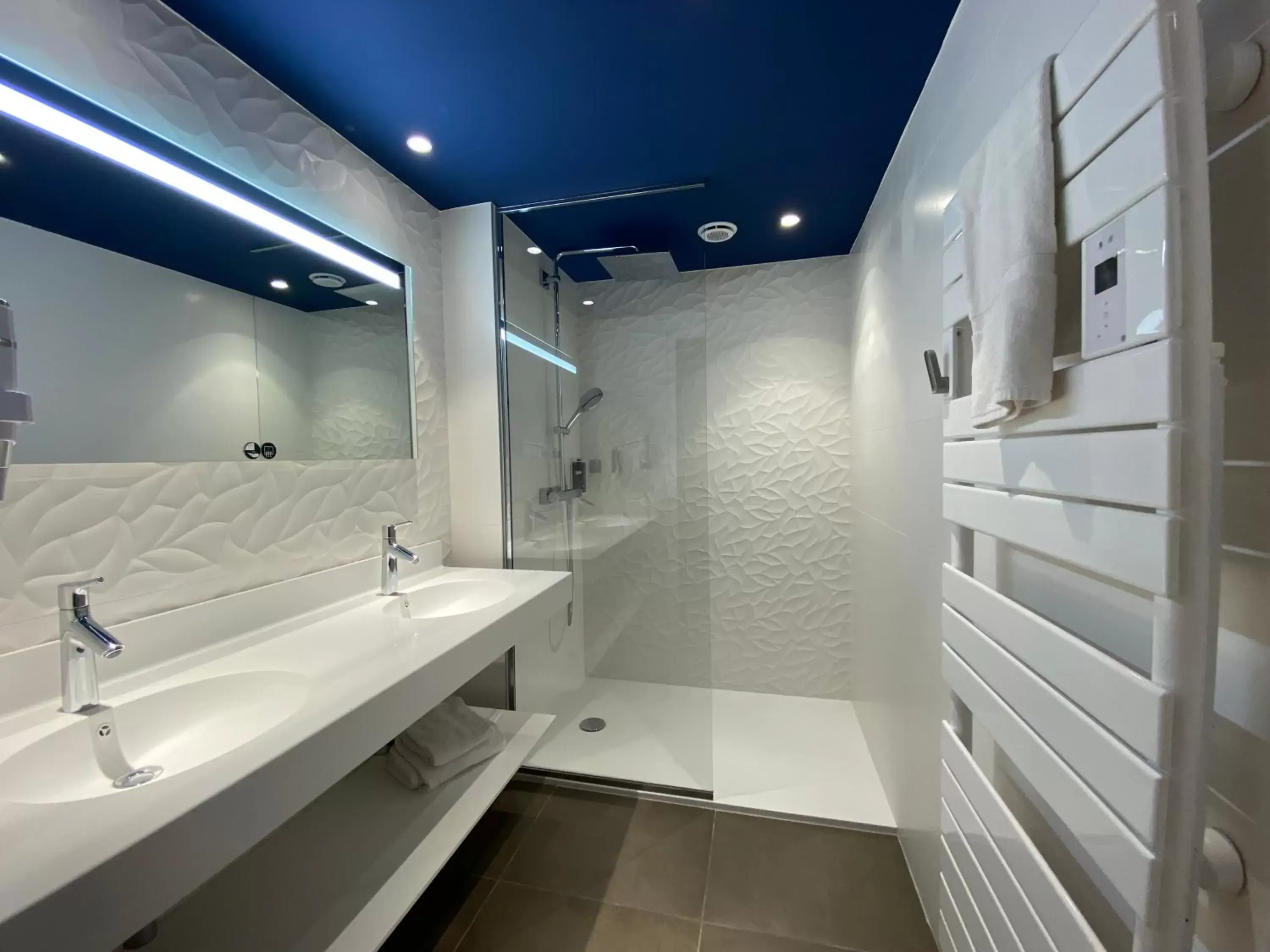 Shower, Bathroom in Brit Hotel Piscine & Spa - Fougères