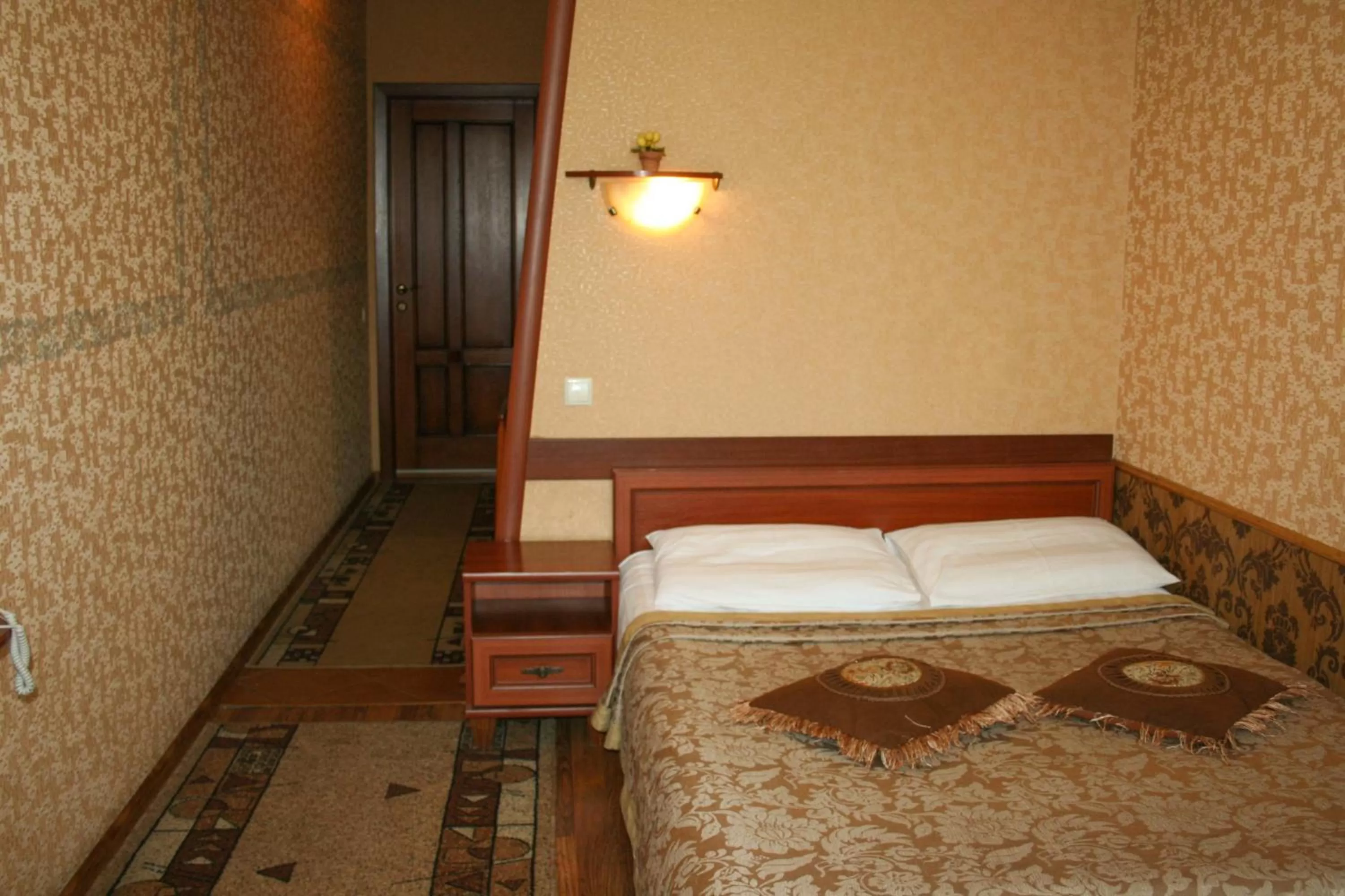 Bed in Don Kihot Hotel