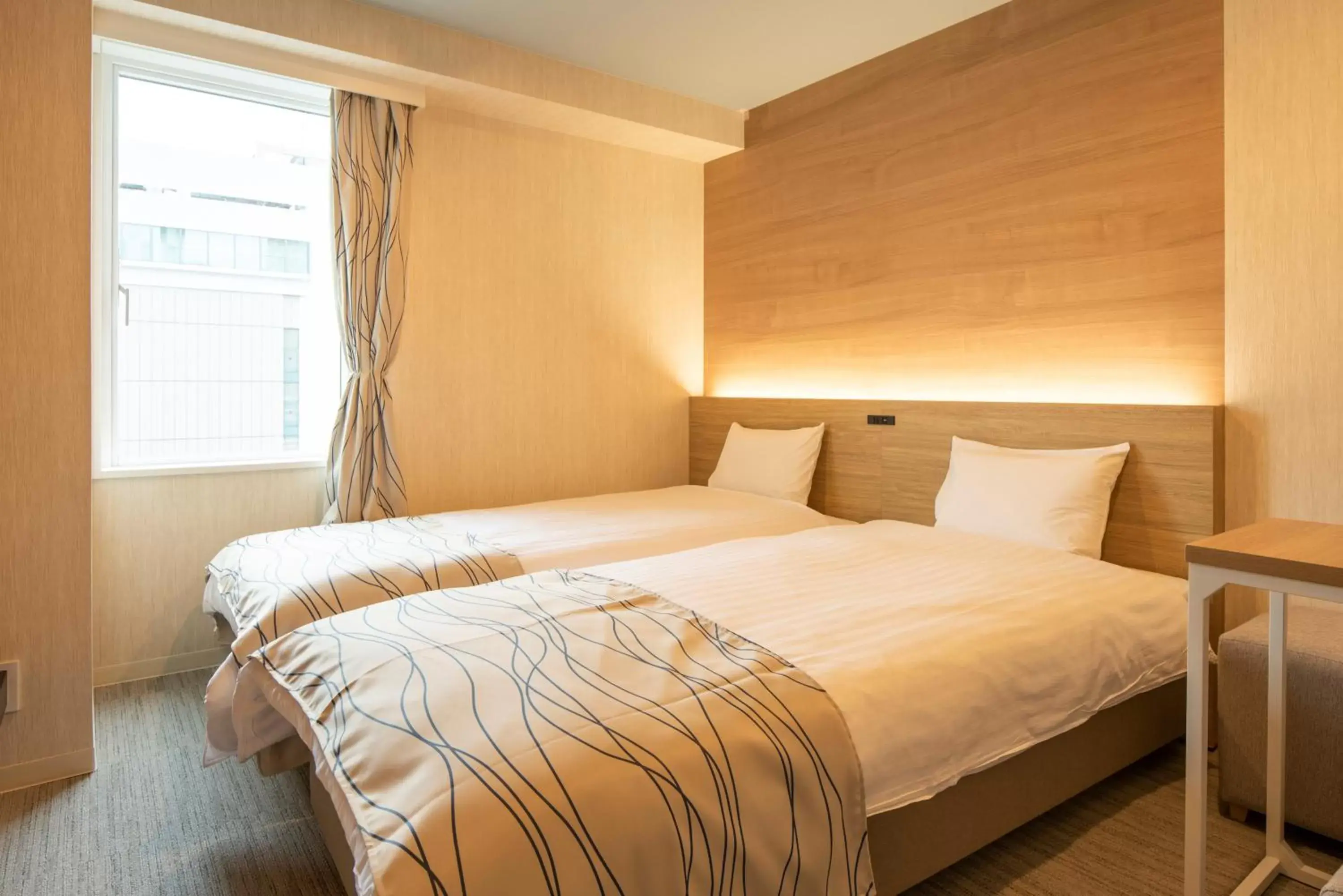 Bed in HOTEL AMANEK Asahikawa Bed in HOTEL AMANEK Asahikawa