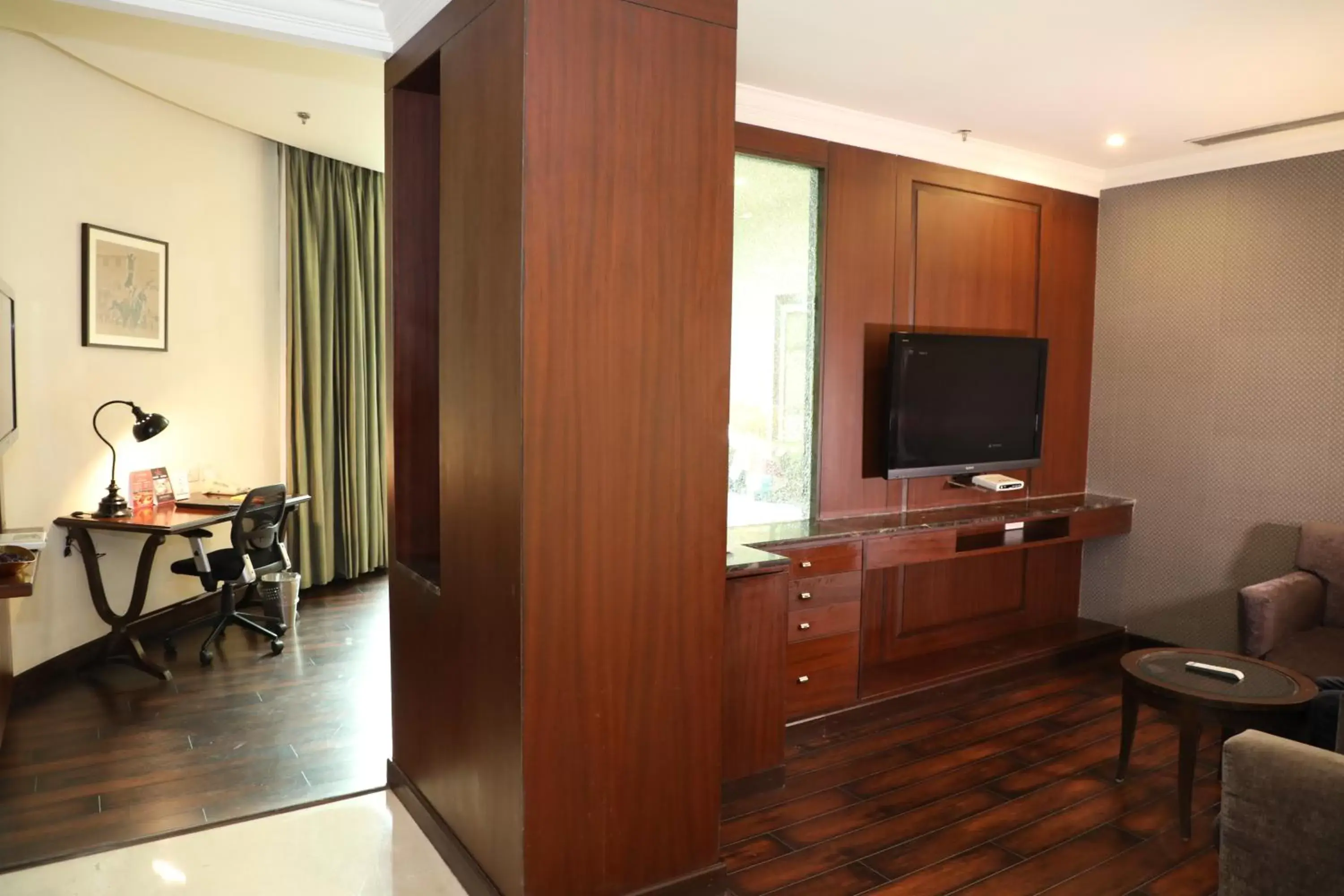 Communal lounge/ TV room, TV/Entertainment Center in Ramada by Wyndham Jalandhar City Center