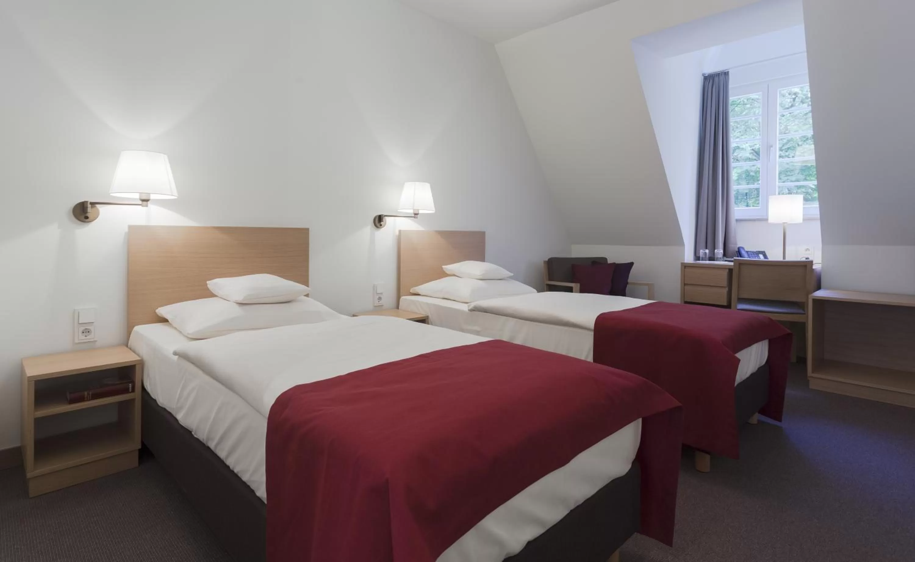 Photo of the whole room, Bed in Kardinal Schulte Haus