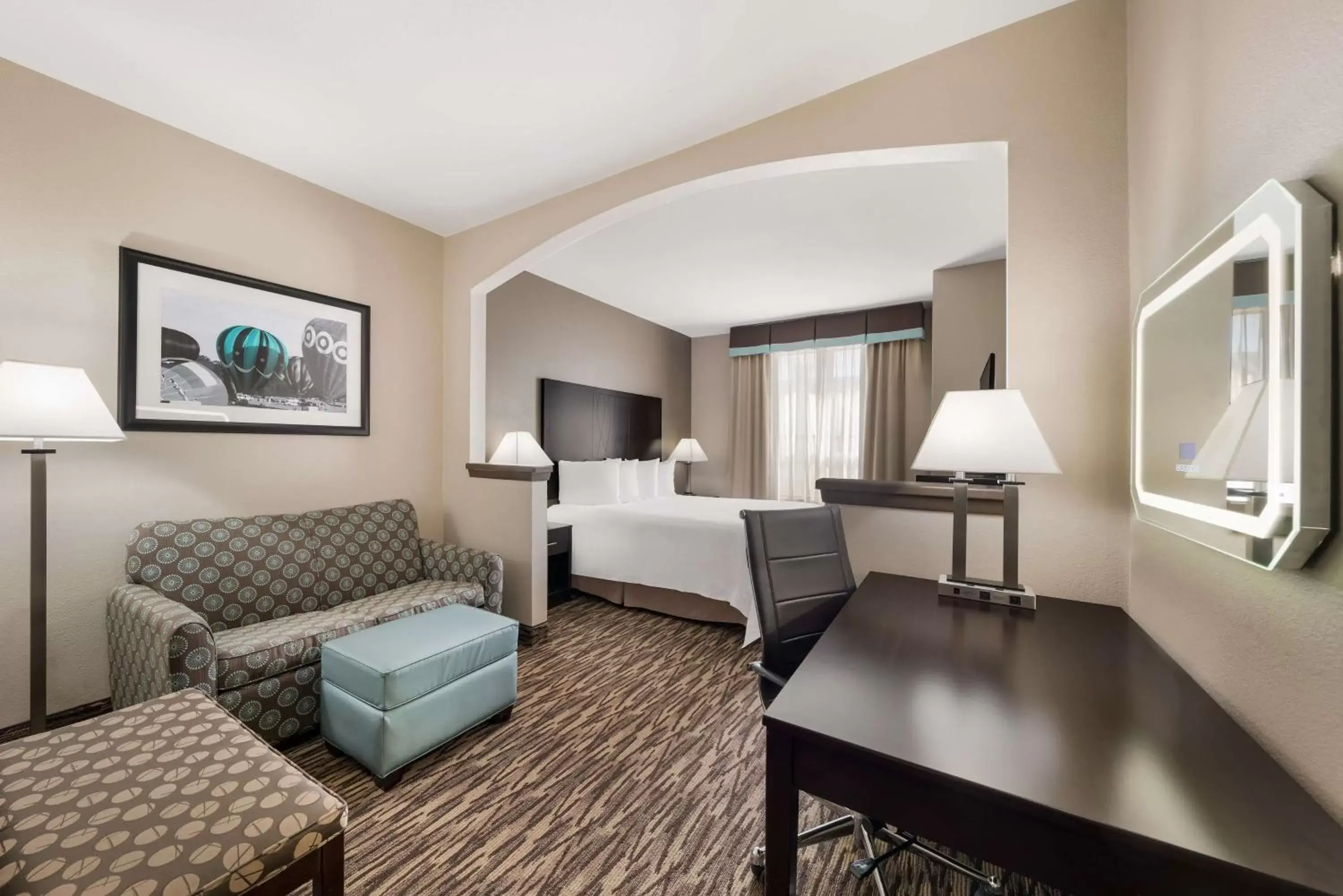 Bedroom, Seating Area in SureStay Plus Hotel by Best Western Plano