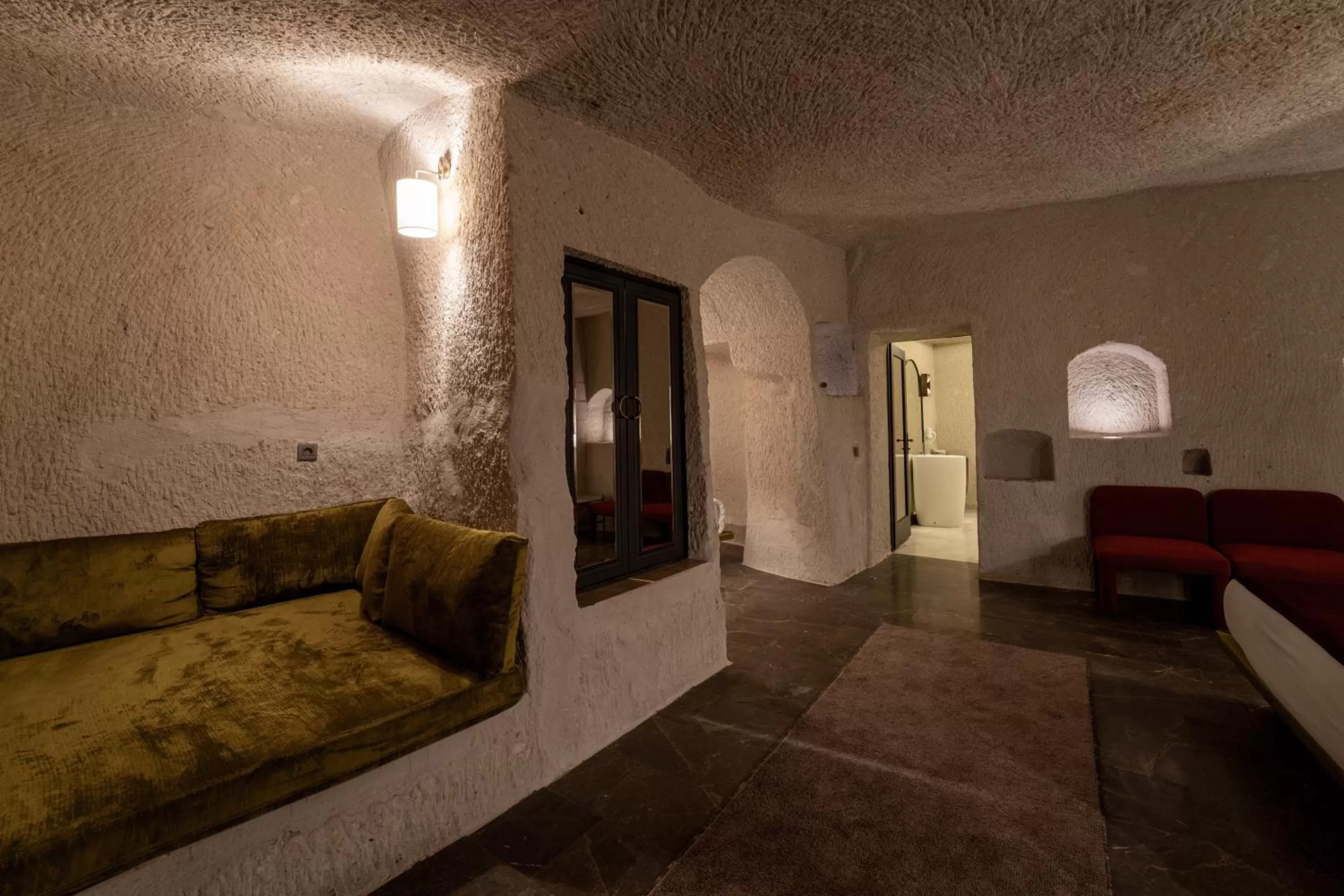 Bedroom, Bed in Artemis Cave Suites & Spa- Adults Only