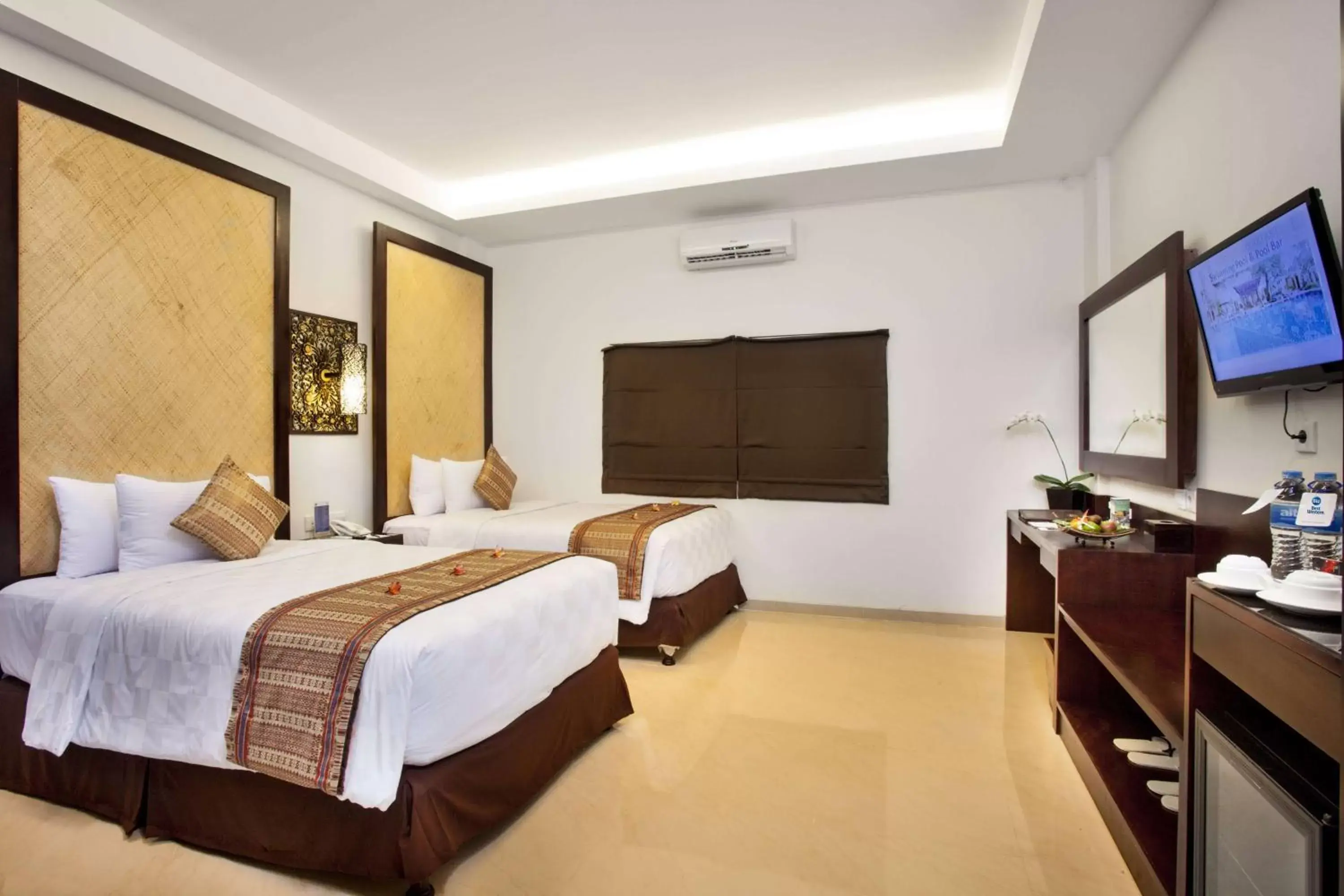 Bedroom in Best Western Kuta Villa