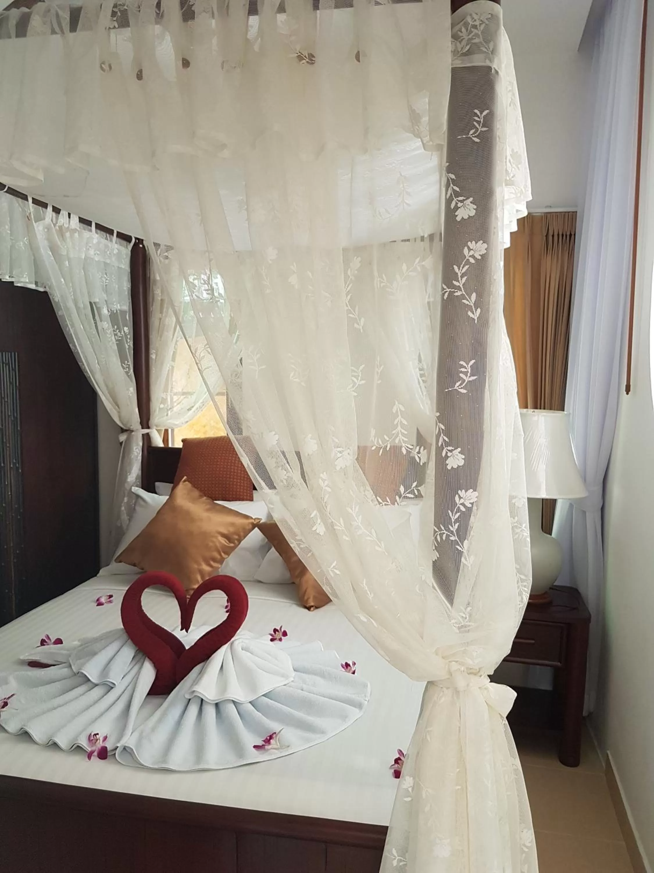 Bed in Jungle Village Bungalow