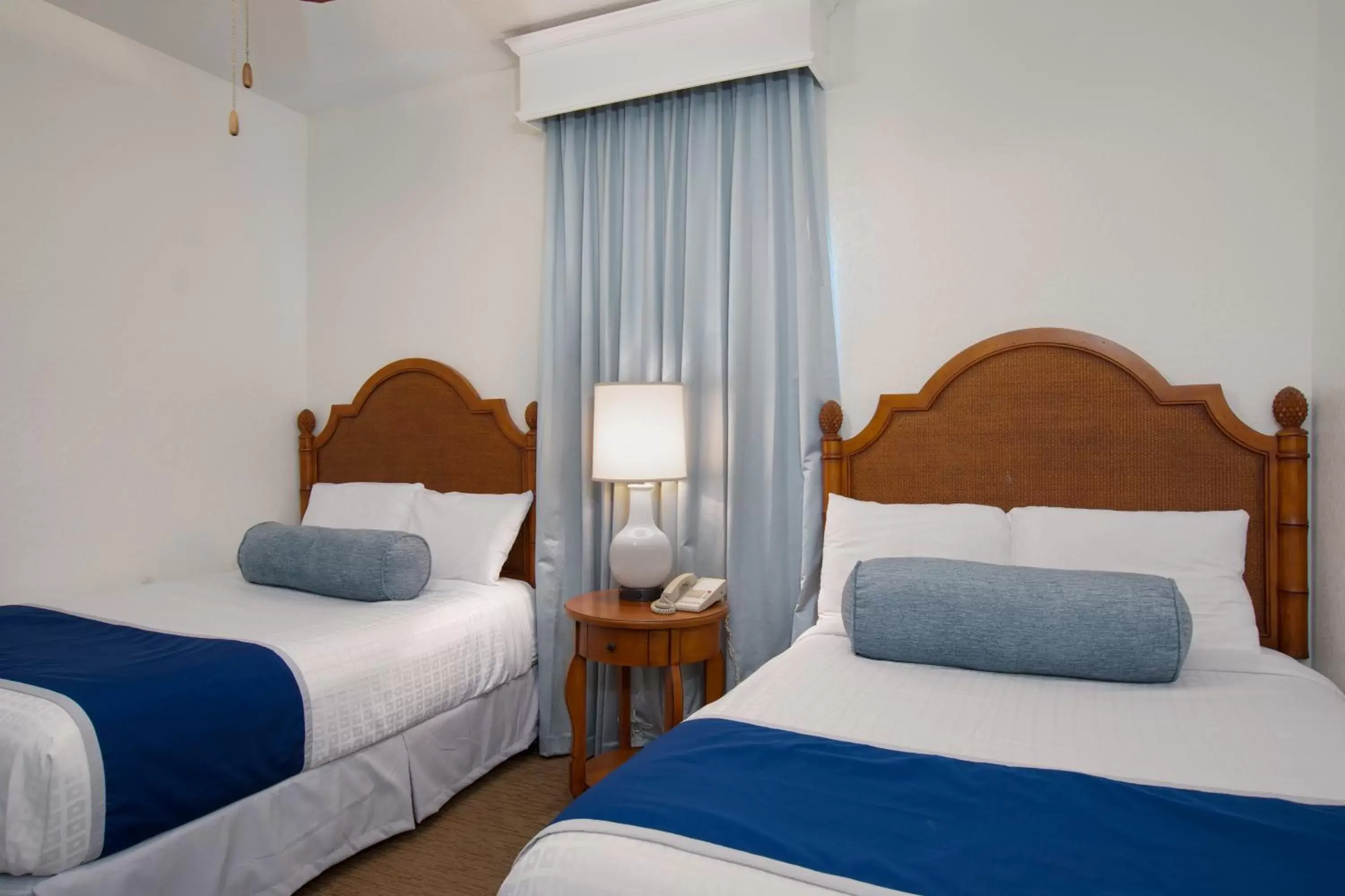Bed in Lake Buena Vista Resort Village and Spa, a staySky Hotel & Resort Near Disney