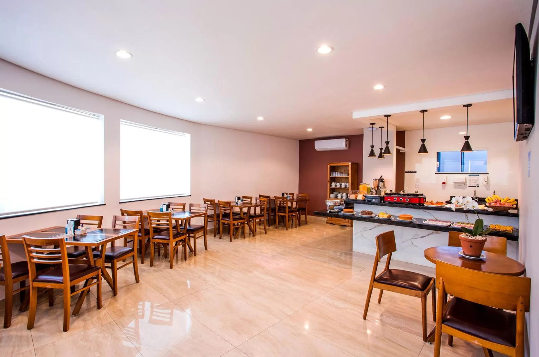Dining area in Hotel Metrópole Paulínia