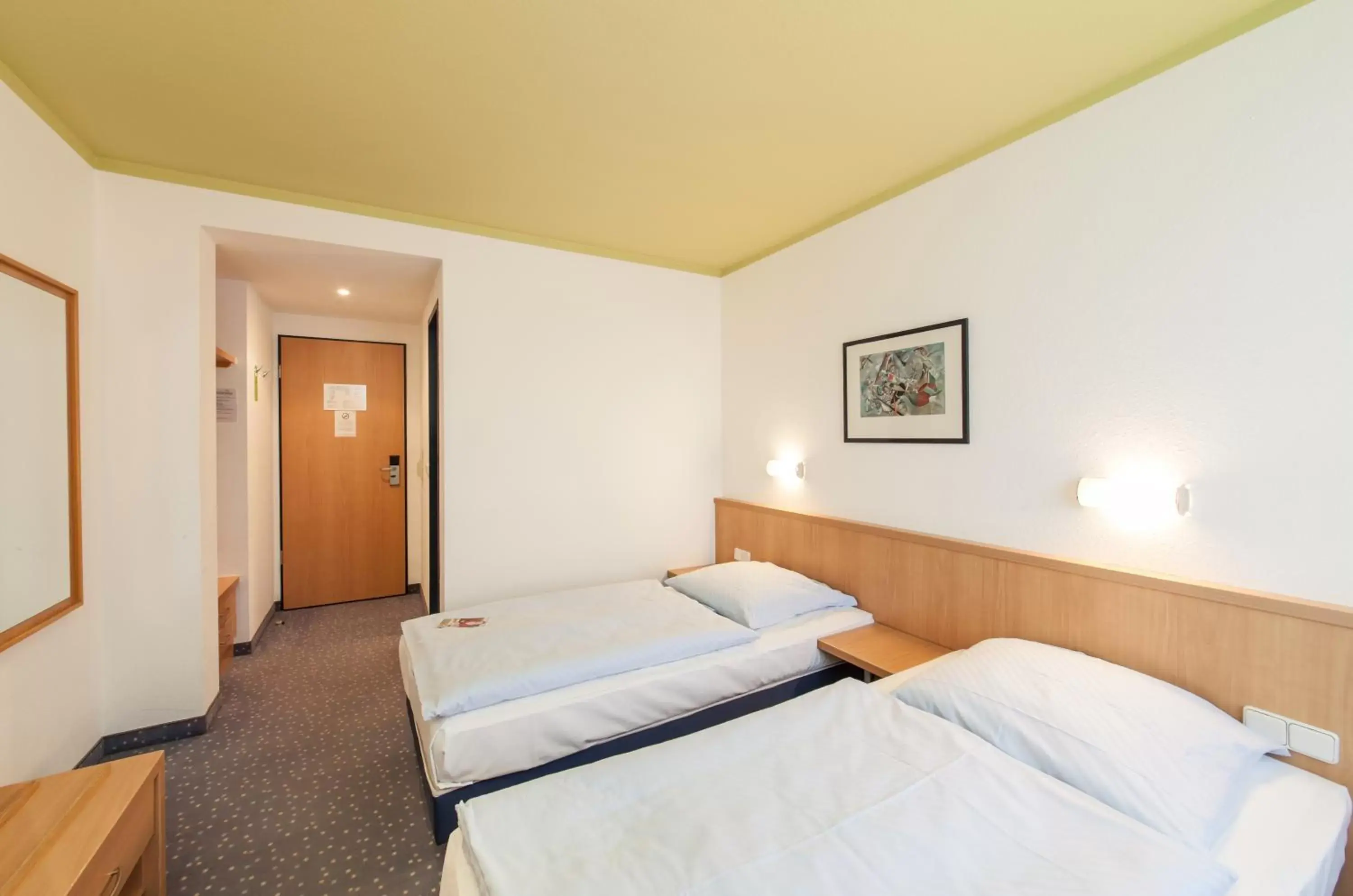 Photo of the whole room, Bed in Novum Hotel Seegraben Cottbus