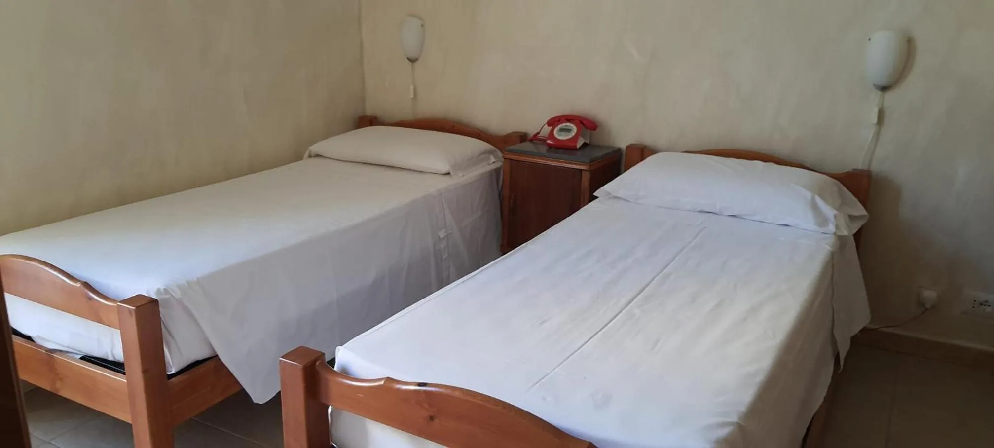 Bed in Albergo Avalon